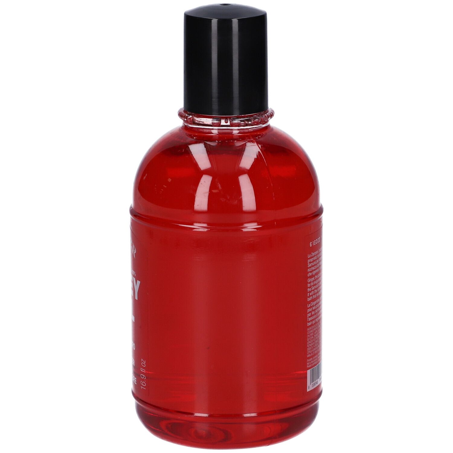 Liquido rosso in una bottiglia di vetro con tappo nero. 16,9 fl oz.