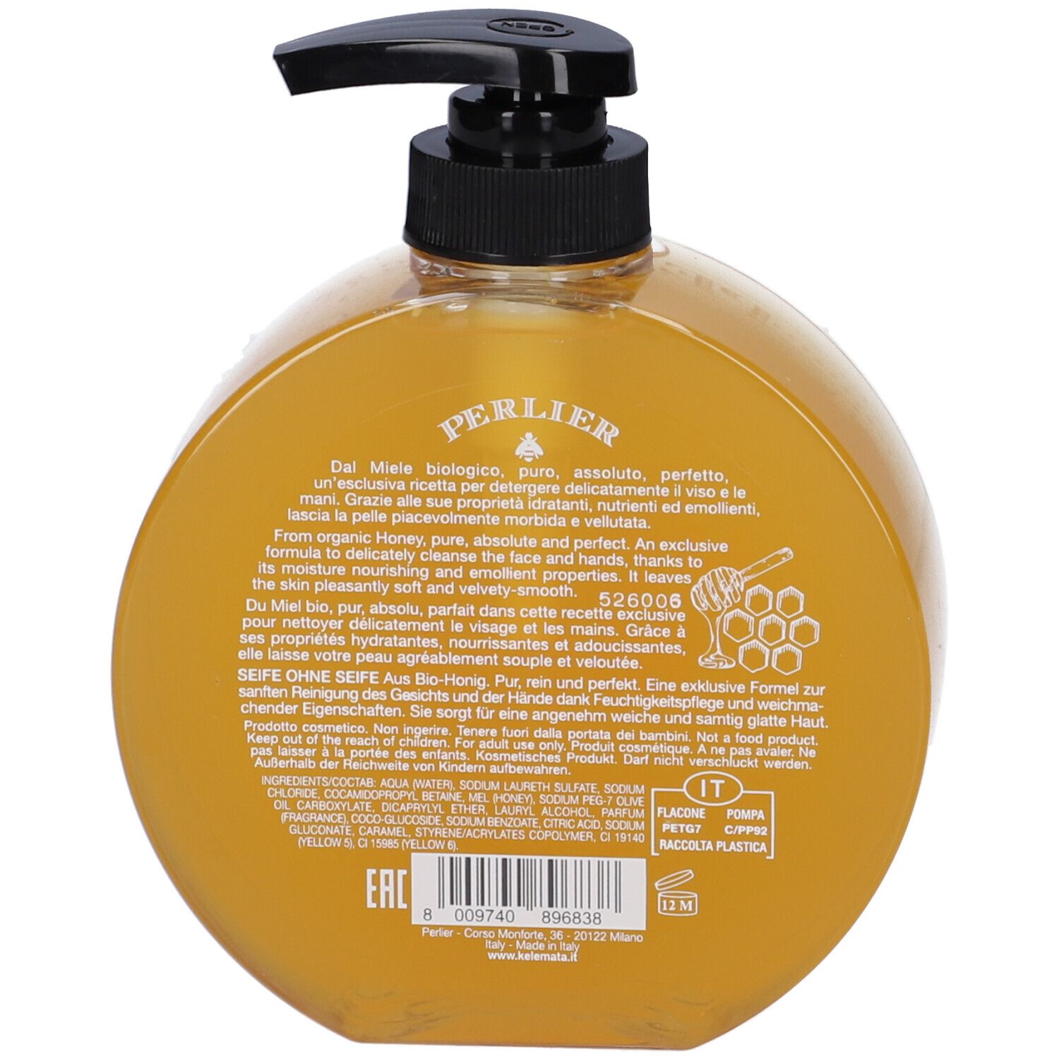 Flacone dispenser rotondo e trasparente con sapone al miele e pompa nera.