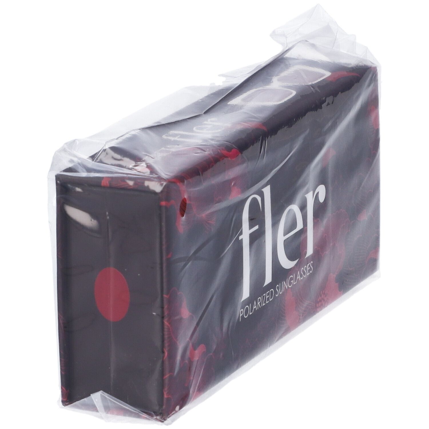 Confezione con motivo floreale e scritta "fler POLARIZED SUNGLASSES". Punto rosso sul lato.