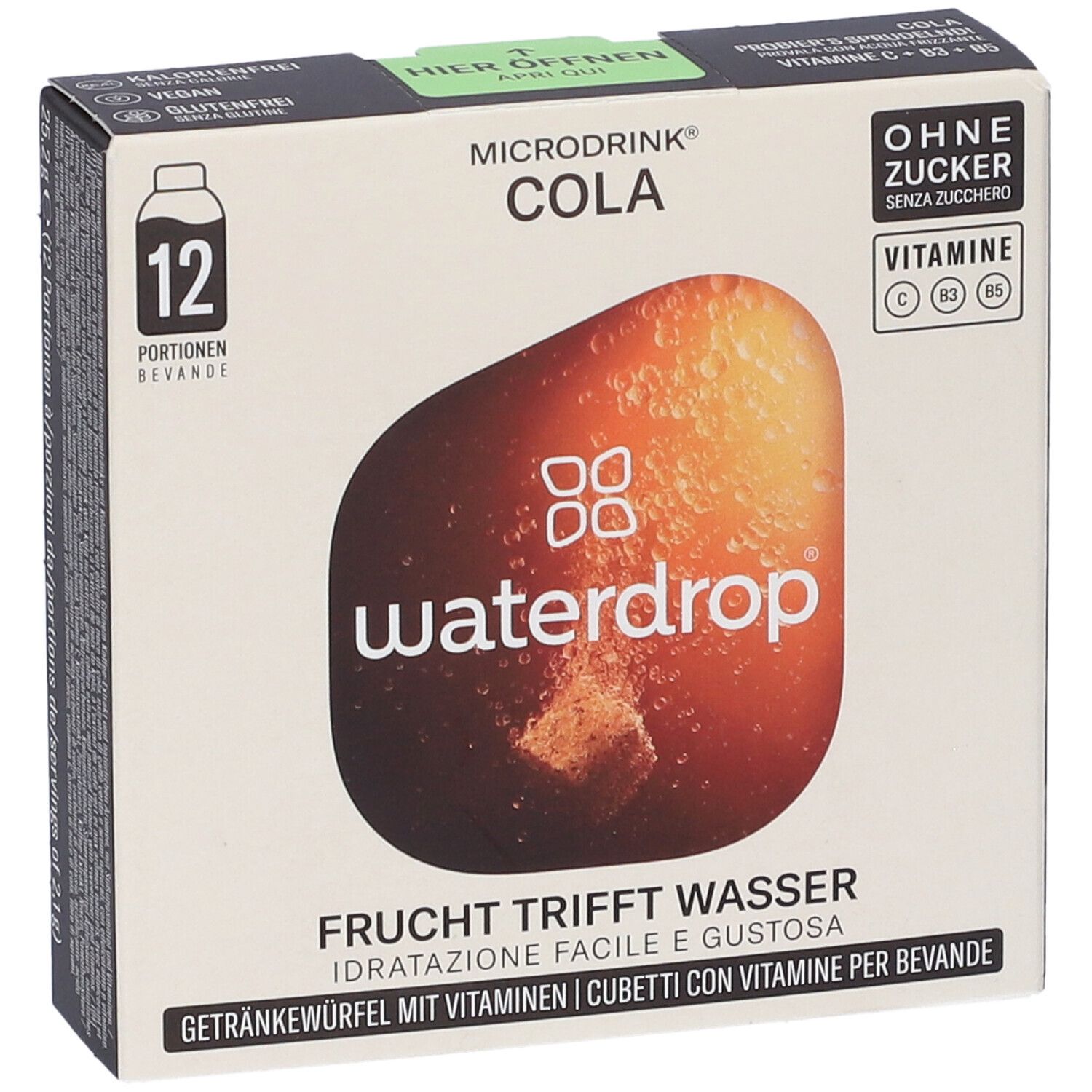 Vista frontale della confezione WATERDROP MICRODRINK COLA. Contiene 12 porzioni. Testo: Senza zucchero, vitamine C, B3, B5. Frutta incontra l'acqua.
