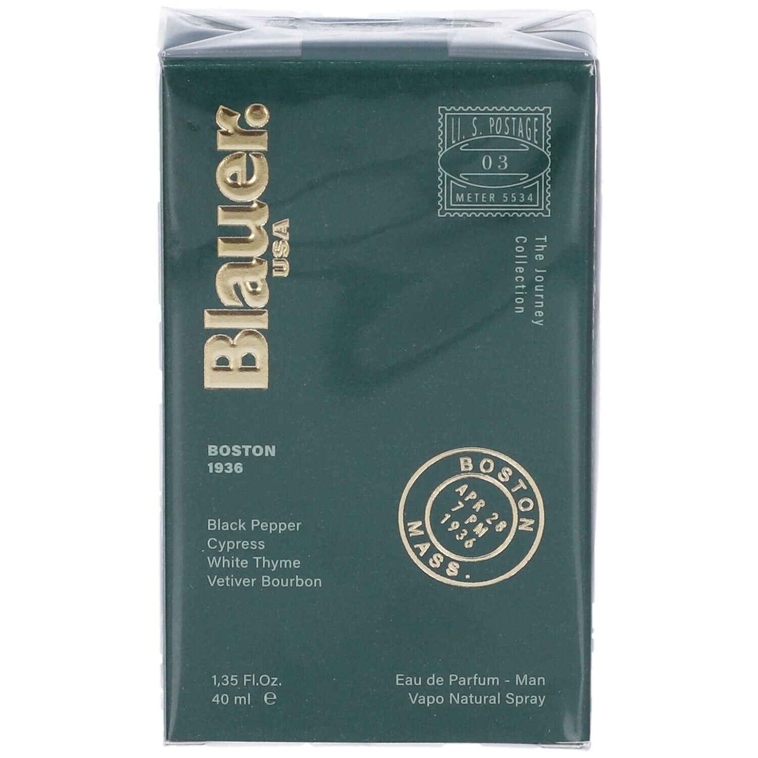 Scatola verde scuro con logo e testo dorati. Contiene informazioni sugli ingredienti e il volume. Eau de Parfum.