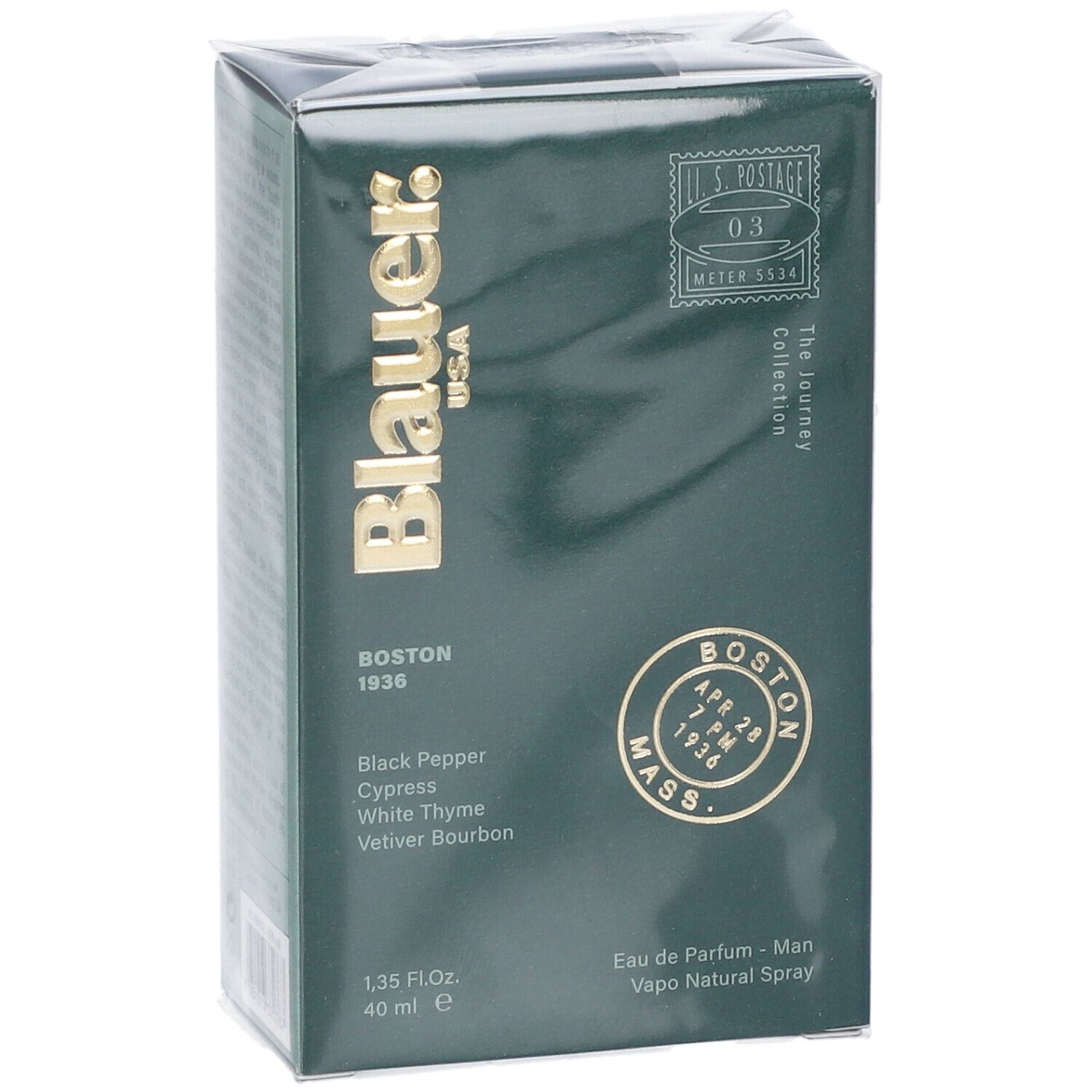 Scatola verde scuro con logo e testo dorati. Contiene informazioni sugli ingredienti e il volume. Eau de Parfum.