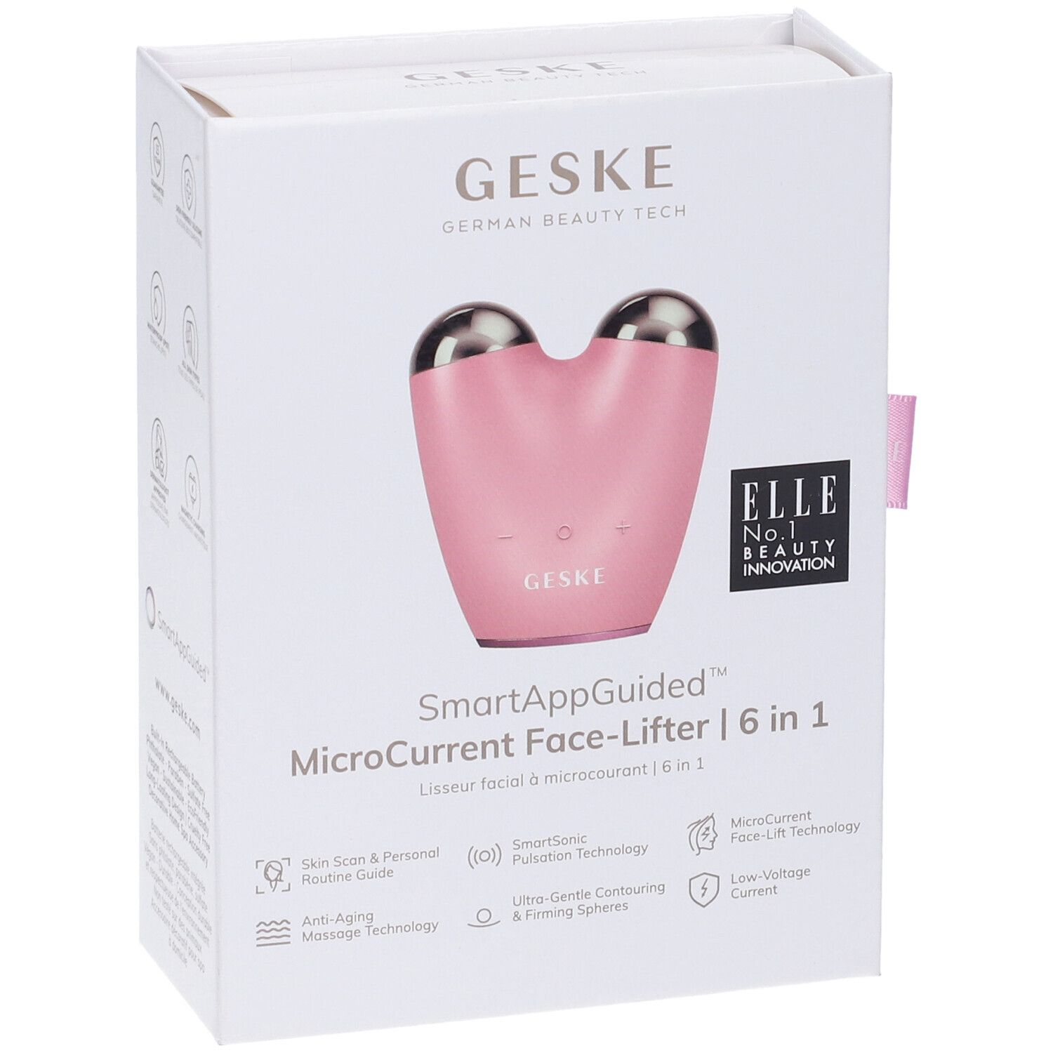 MicroCurrent Face-Lifter rosa nella confezione. Scritte: GESKE, SmartAppGuided, ELLE, premi. Fiocco rosa.