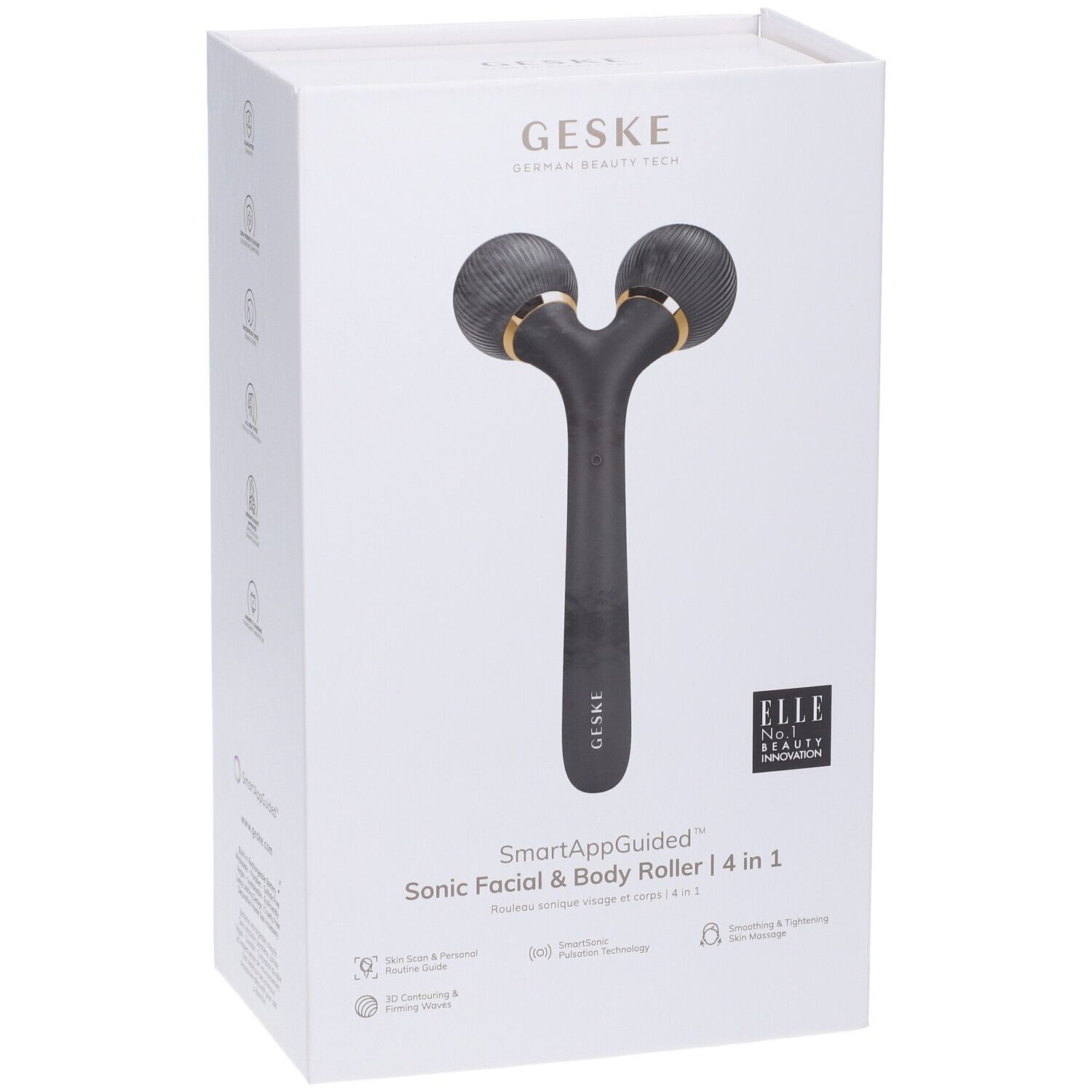 Confezione, fronte. Rullo nero con due testine rotonde e dettagli dorati. Testo: SmartAppGuided, Sonic Facial & Body Roller 4 in 1. Logo ELLE.