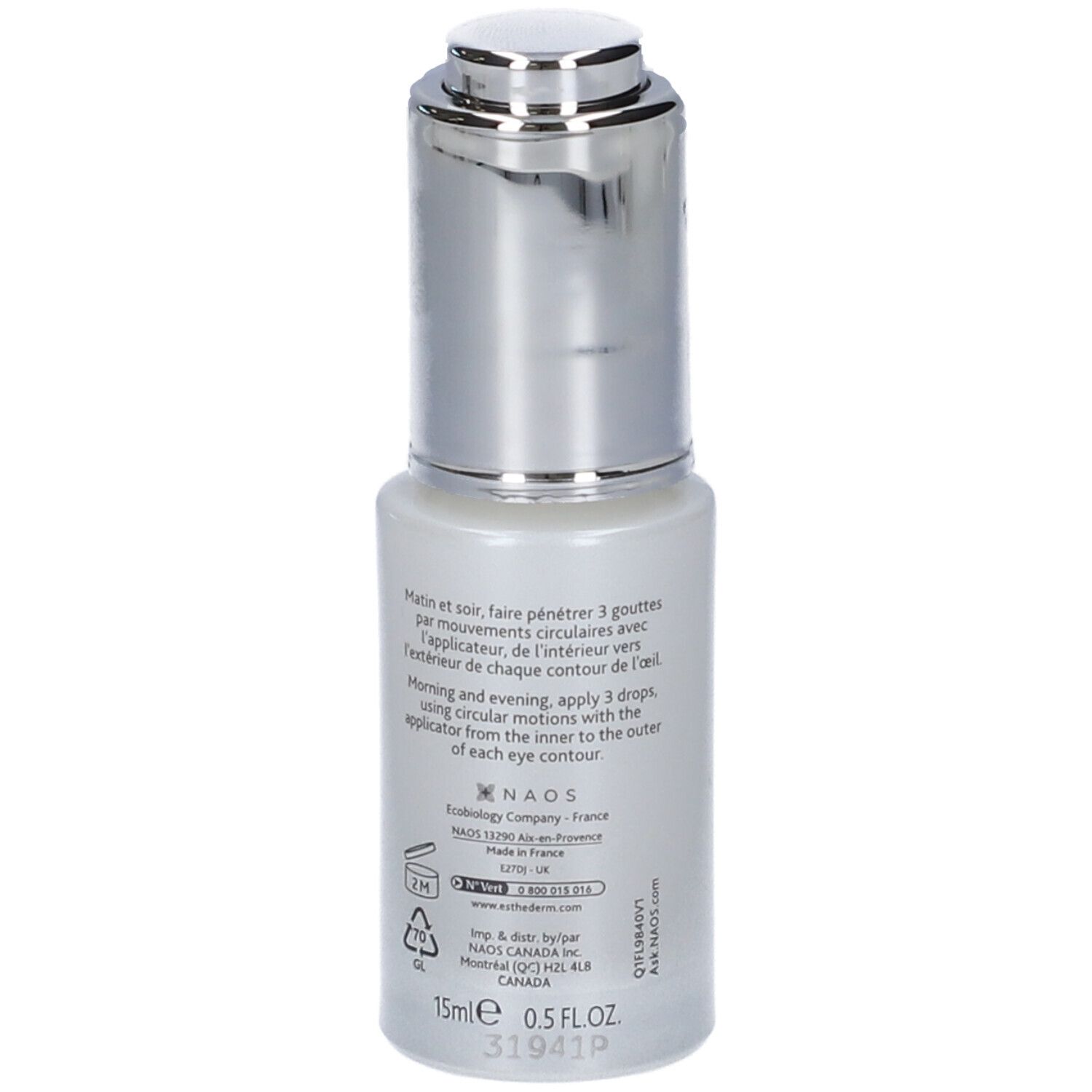 Piccola bottiglia ovale con tappo argentato. Retro con testo. Scritta: 15ml 0.5 FL.OZ. Istruzioni in inglese e francese.