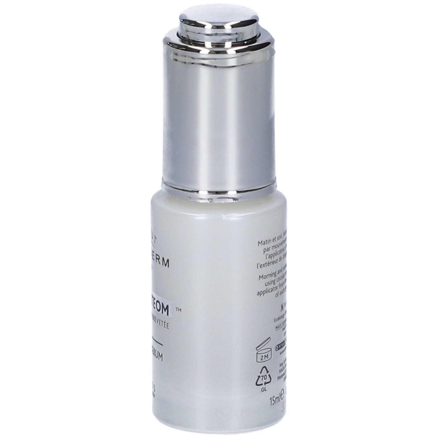 Piccola bottiglia ovale con tappo argentato. Retro con testo. Scritta: 15ml 0.5 FL.OZ.