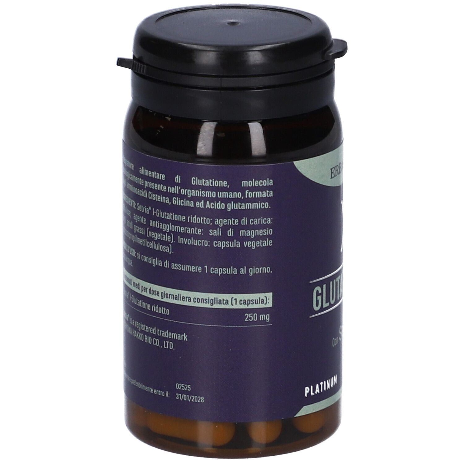 Retro del flacone. Informazioni testuali su sfondo viola. Contiene informazioni sugli ingredienti e sul dosaggio.