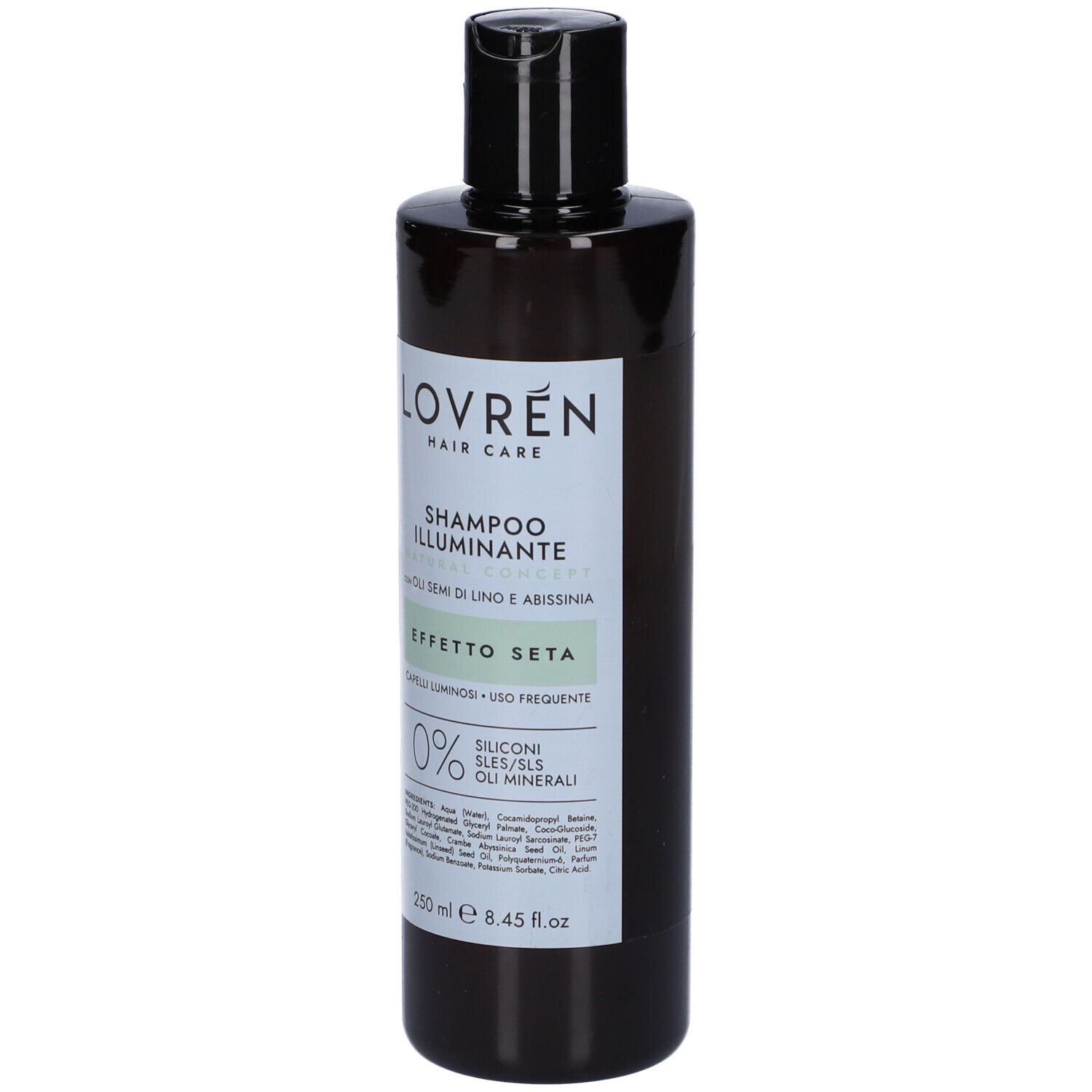 Flacone di shampoo scuro con tappo nero. Etichetta con nome del prodotto e ingredienti. 250 ml.