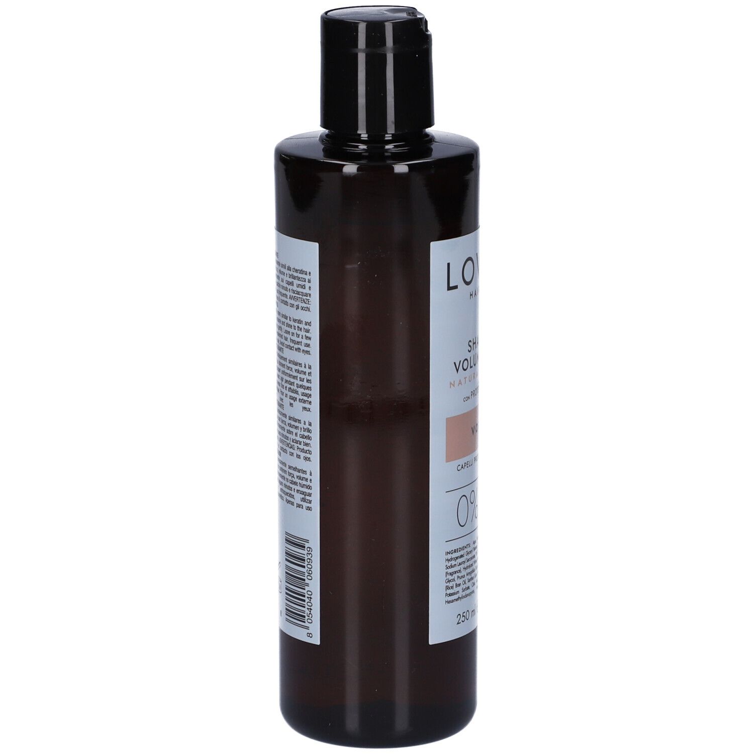Flacone di shampoo marrone con tappo nero. Etichetta con informazioni sul prodotto e codice a barre. Vista posteriore.