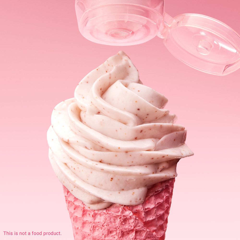 Cono gelato rosa con crema rosa. Scritta: This is not a food product. Coperchio sopra.