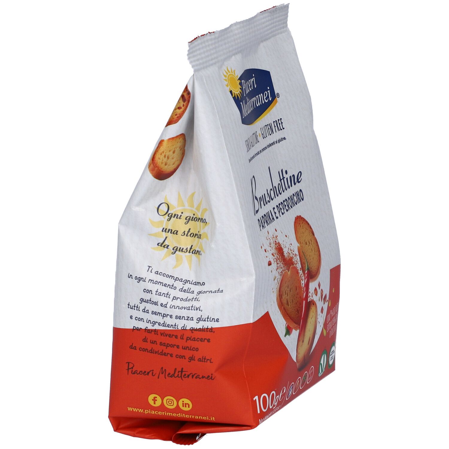 Lato confezione Bruschettine Paprika e Peperoncino. Sacchetto bianco-rosso con testo e logo. Senza glutine.