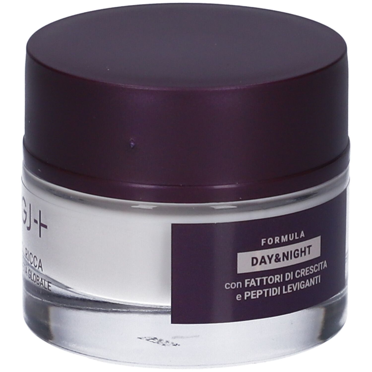 Vasetto di crema con coperchio scuro. Scritta: ROUGJ+, FORMULA DAY&NIGHT, ingredienti.