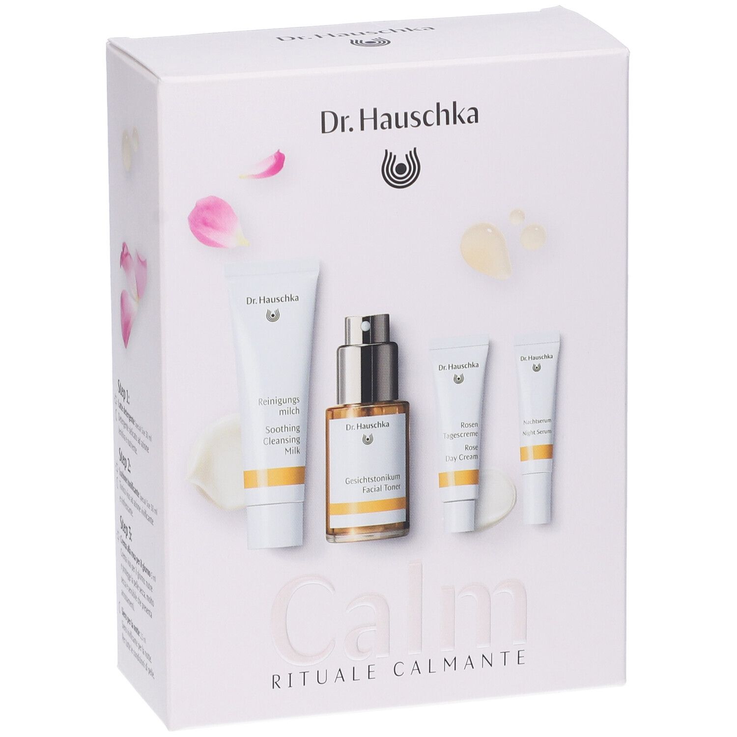 Set regalo con quattro prodotti. Scatola bianca con immagini e scritta "Calm". Marchio: Dr. Hauschka.