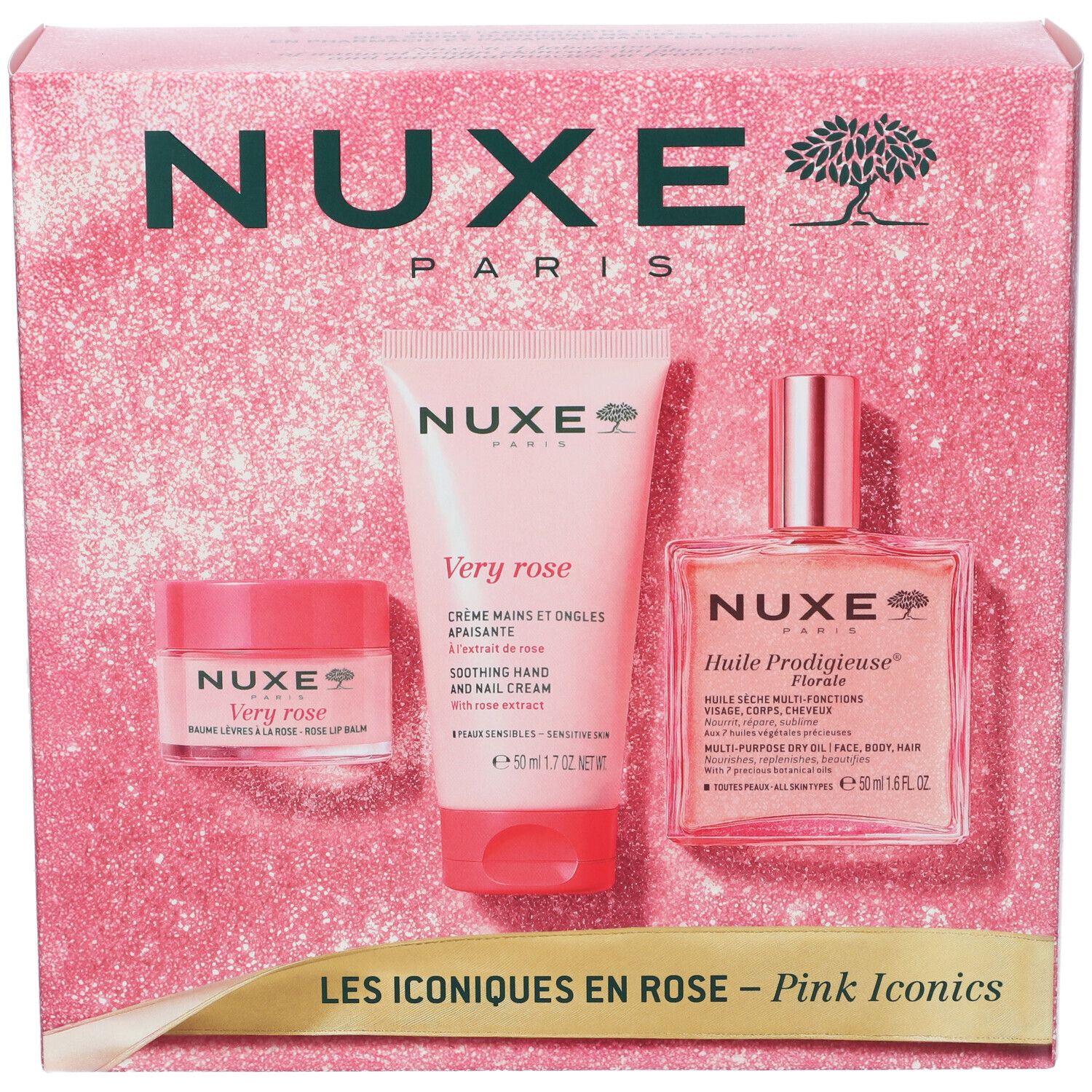 Set Nuxe Pink Iconics con crema mani, balsamo labbra e olio corpo in confezione rosa.