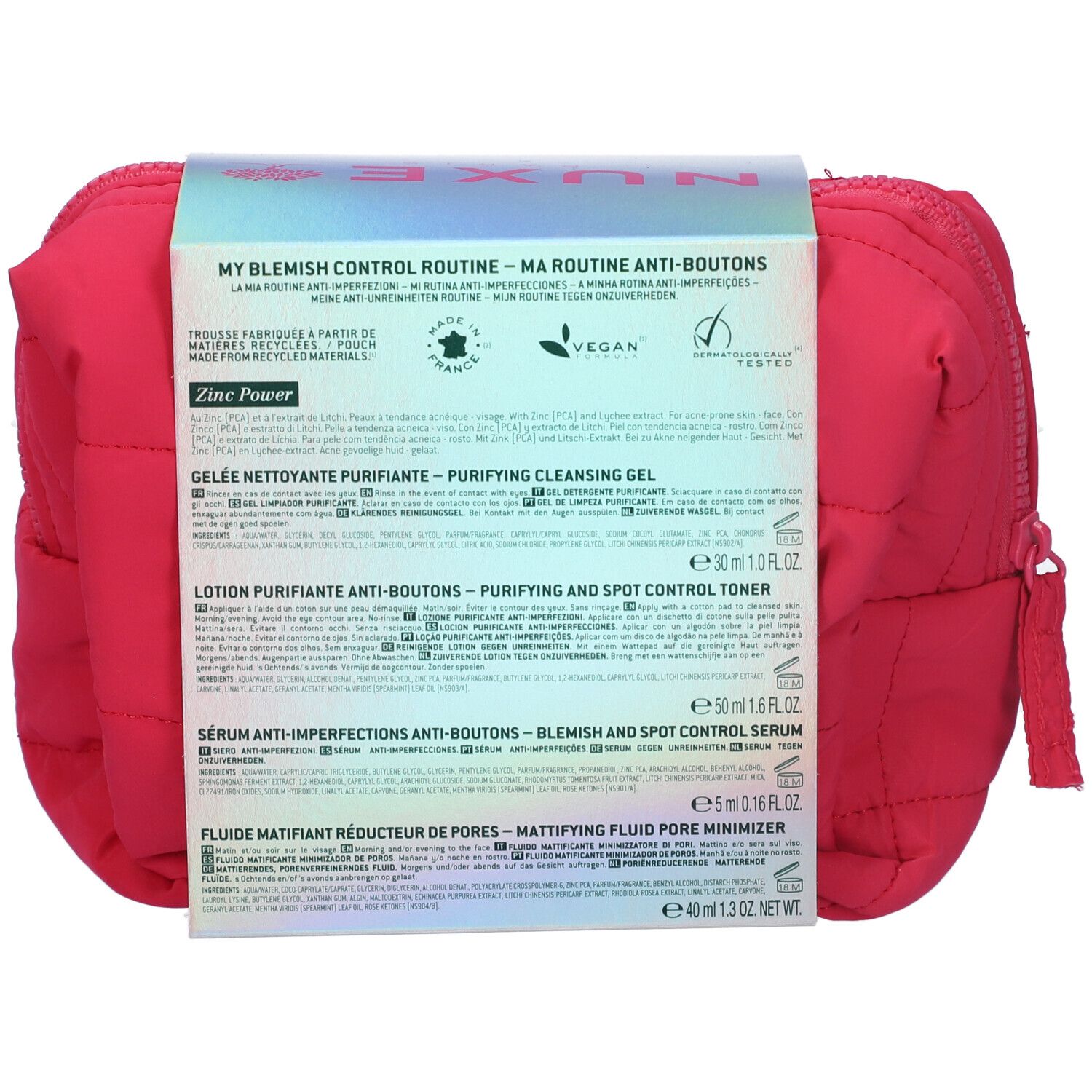 Retro della pochette rossa con informazioni sul prodotto. Contiene testo e loghi, tra cui Vegan e dermatologicamente testato.