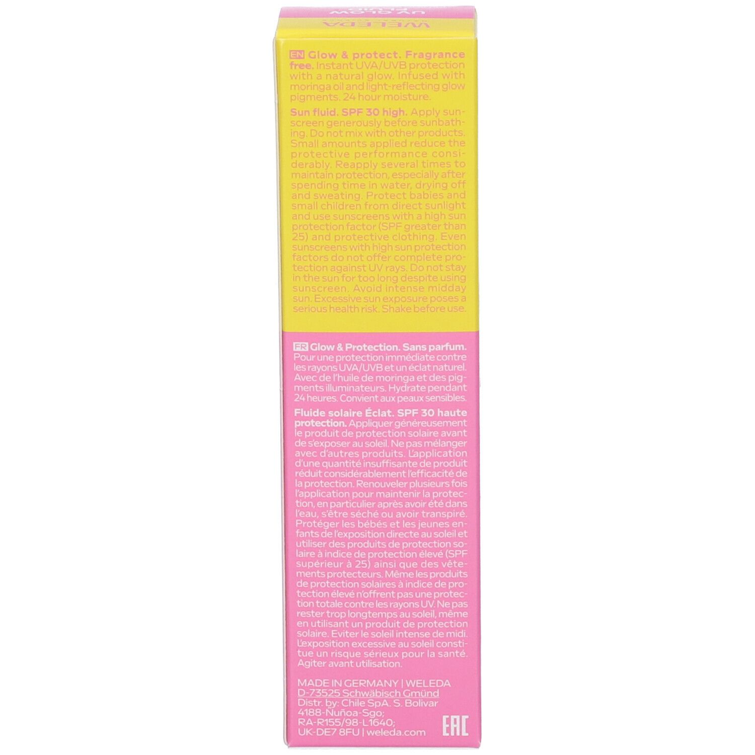Lato della scatola rosa. Testo multilingue. Scritta: Glow & Protect, Sun Fluid SPF 30 High, Made in Germany.