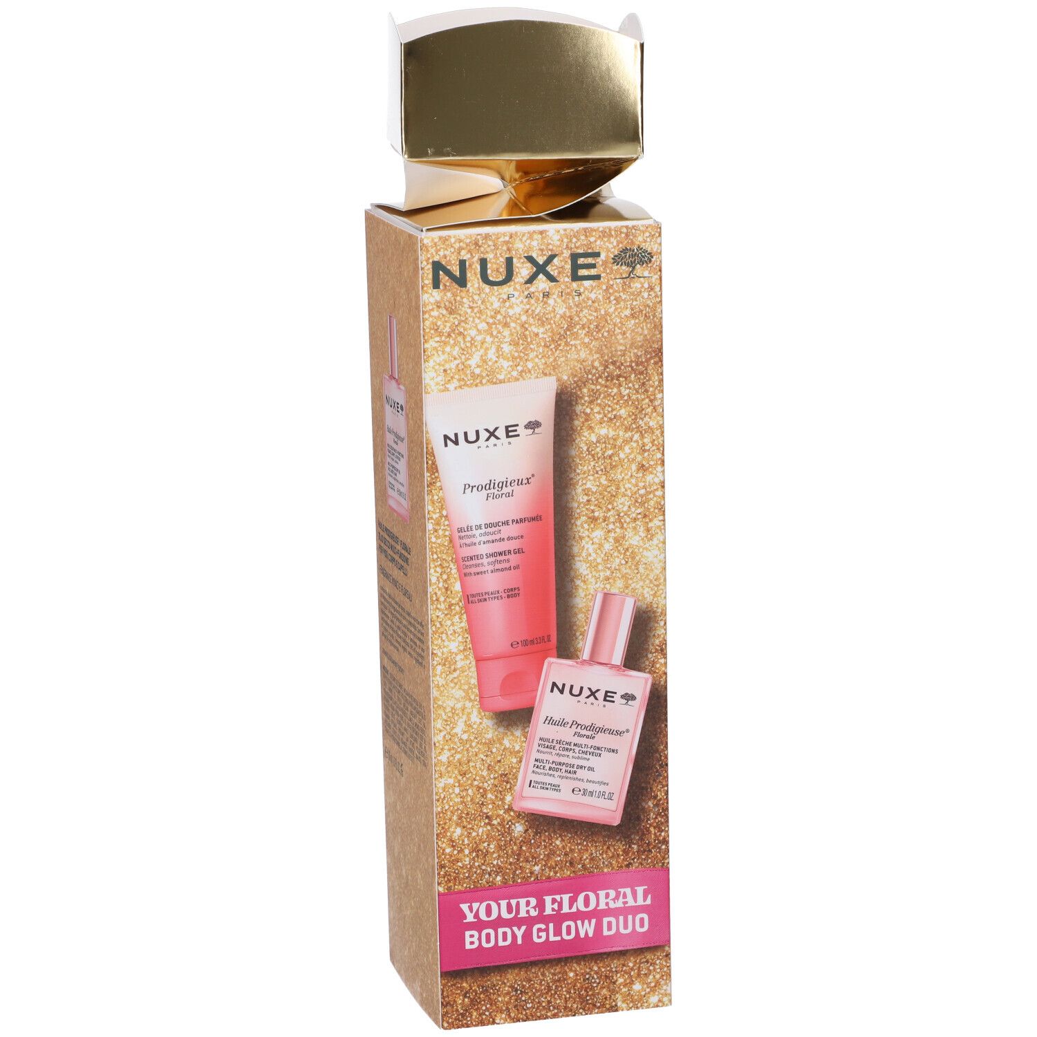 Set regalo Nuxe con due prodotti per la cura del corpo in confezione dorata e scintillante. Contiene crema e olio.
