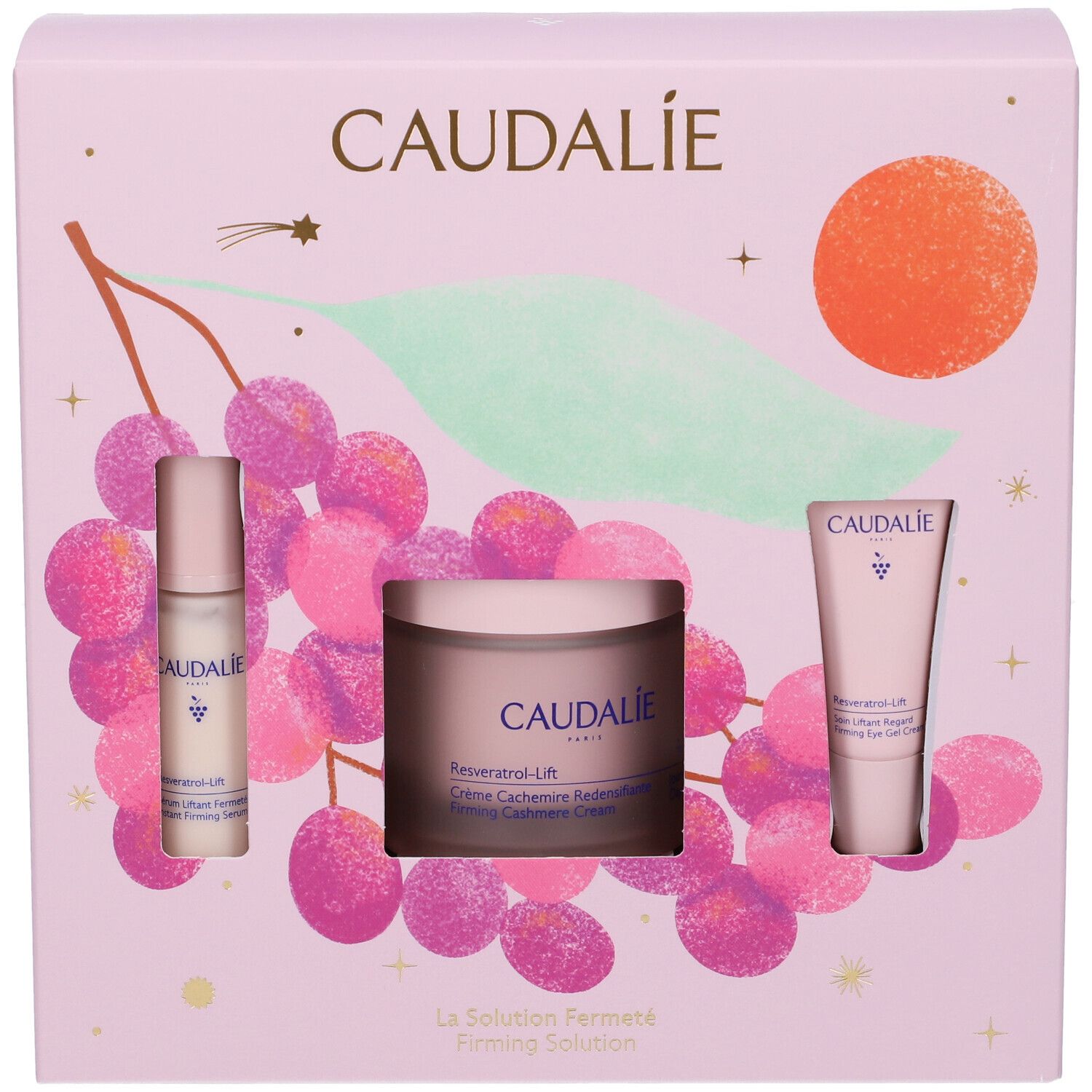 Confezione regalo Caudalie Resveratrol-Lift con crema viso, siero e contorno occhi, packaging rosa con uva.