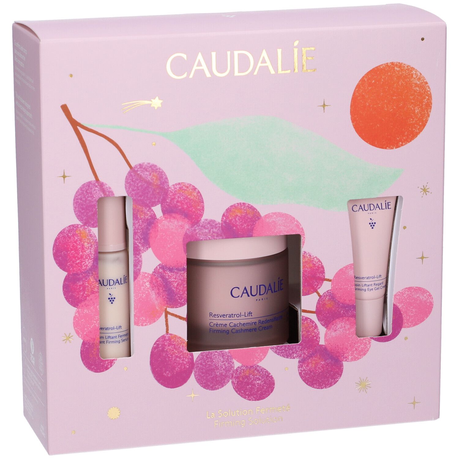 Confezione regalo Caudalie Resveratrol-Lift con crema viso, siero e contorno occhi, packaging rosa con uva.