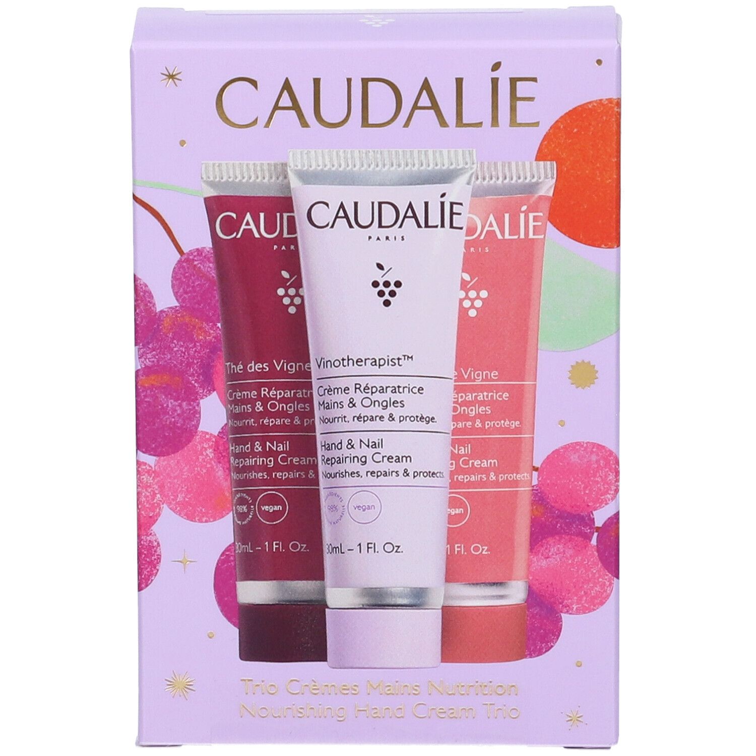 Trio creme mani Caudalie, 3 tubetti da 30ml in cofanetto viola con decorazione d'uva.