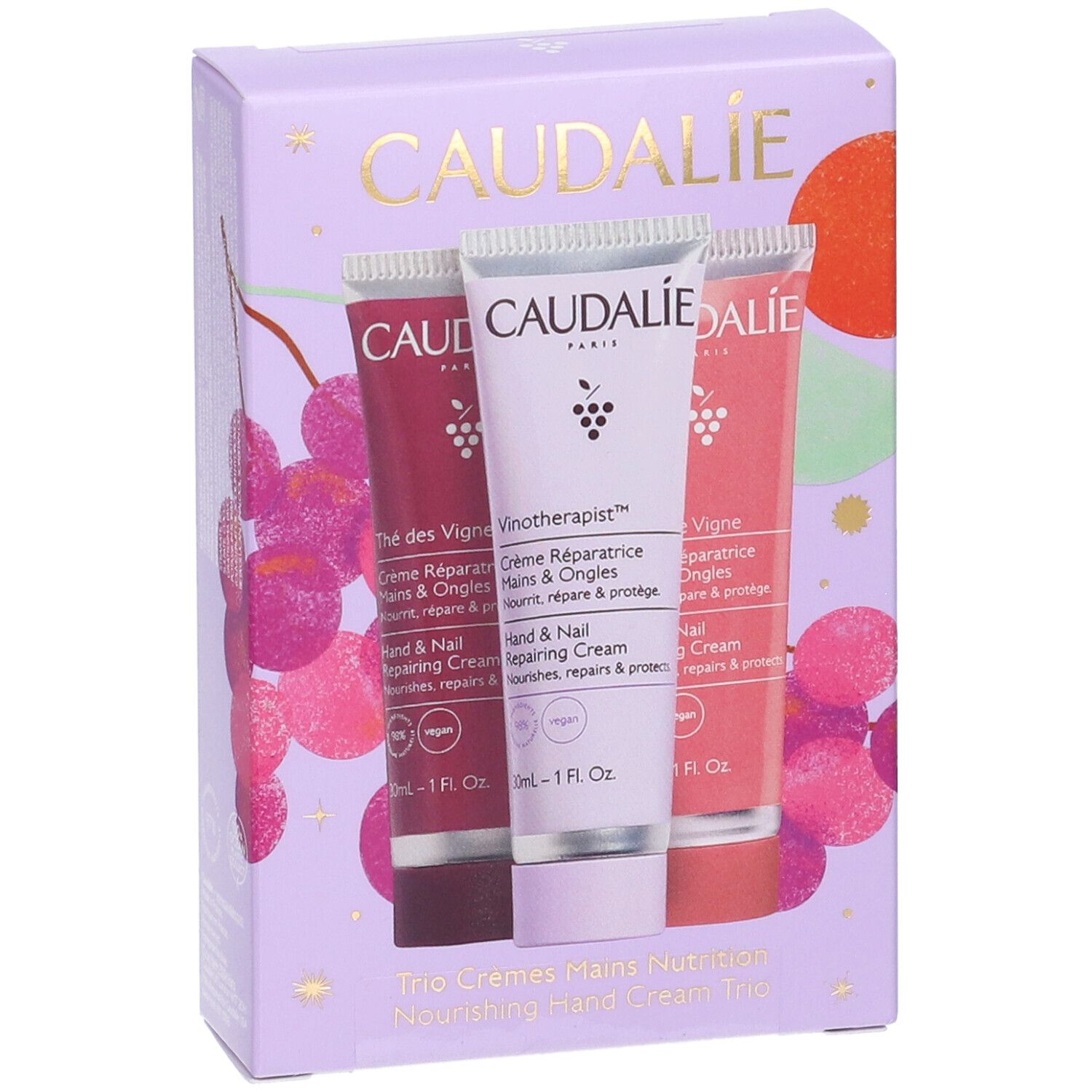 Trio creme mani Caudalie, 3 tubetti da 30ml in cofanetto viola con decorazione d'uva.