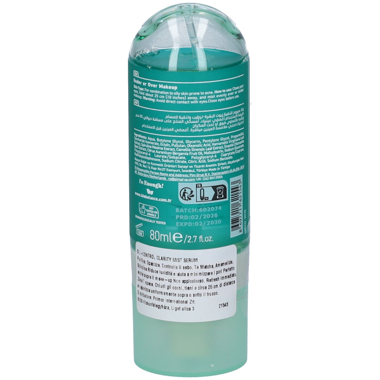 Retro di una bottiglia trasparente con etichetta turchese, che mostra un Mist Serum.