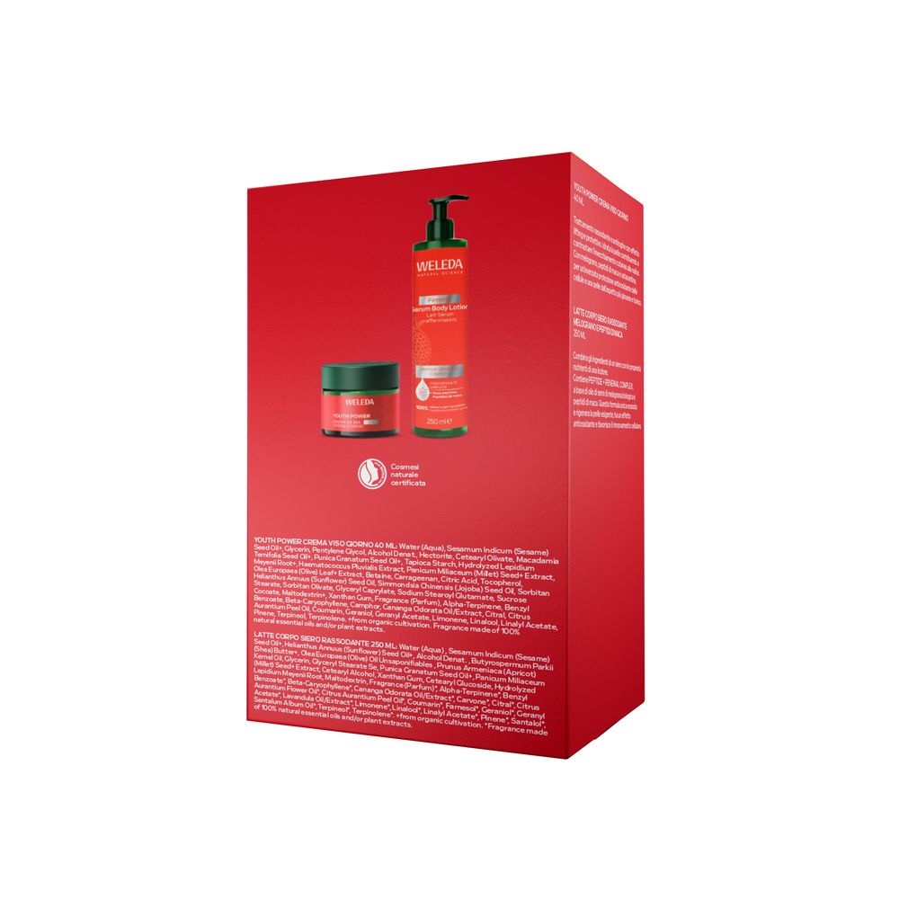 Scatola regalo rossa con olio corpo e crema mani Weleda. Contiene flacone con pompa e vasetto.