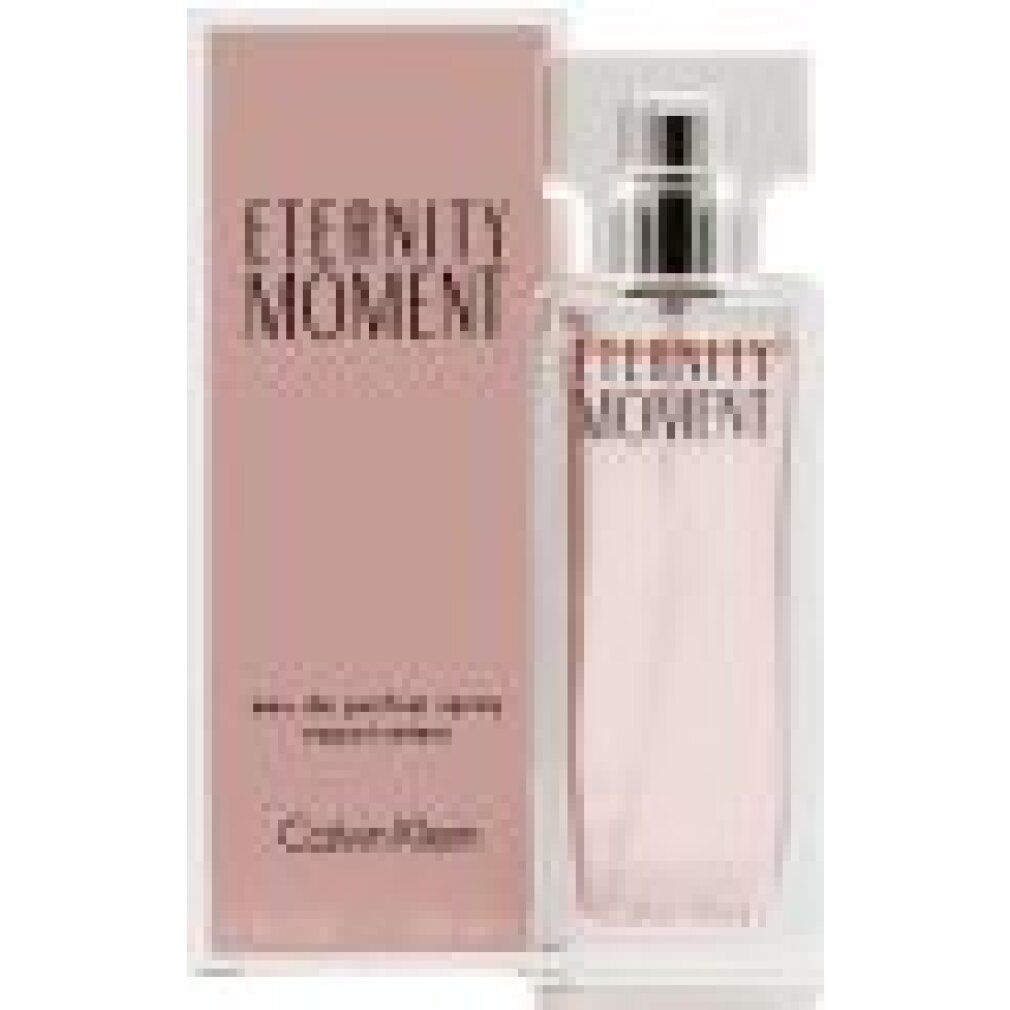 Flacone di profumo e confezione. Liquido rosa in flacone di vetro rettangolare. Scritta: Eternity Moment, Calvin Klein.