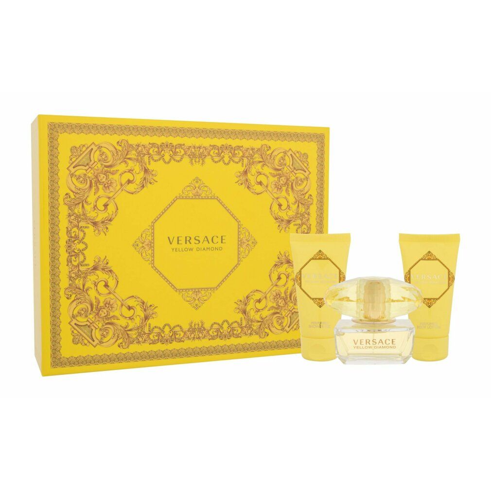 Set regalo giallo Versace con flacone, due tubi e scatola con decorazioni dorate.