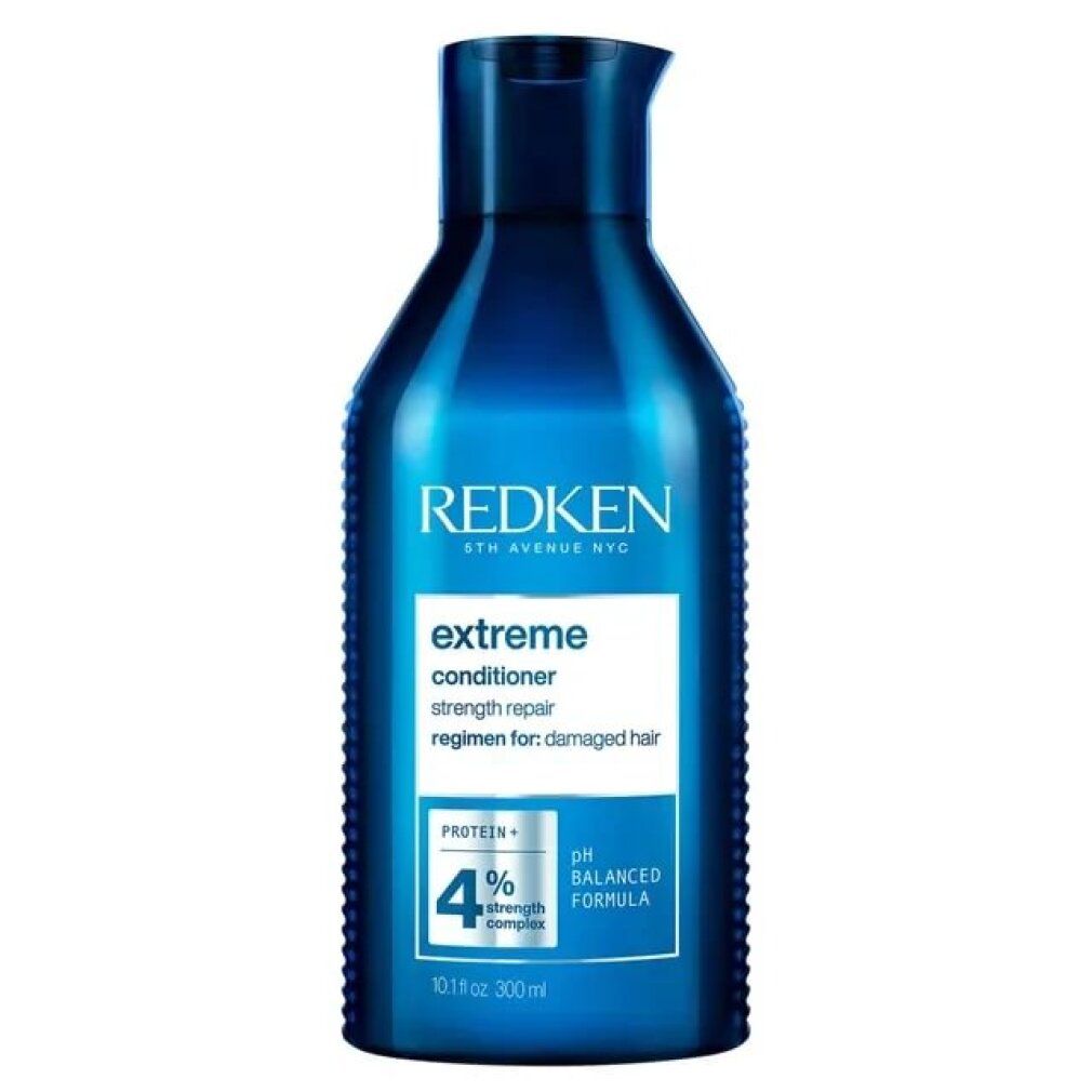 Flacone blu scuro di Redken Extreme Conditioner. Contiene 300 ml. Scritta: Extreme, pH Balanced Formula, 4% Strength Complex.