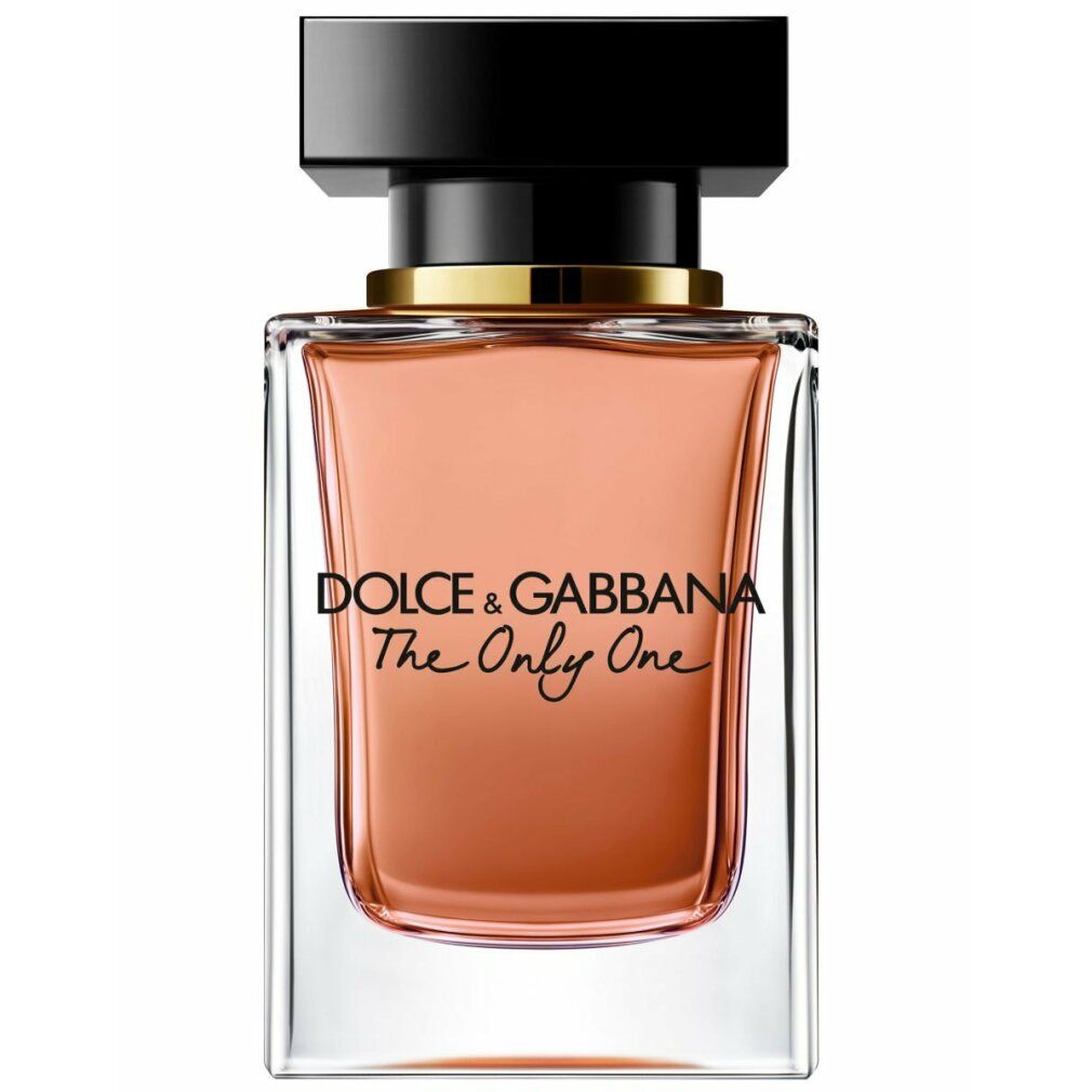 Flacone di profumo, quadrato, liquido rosa, tappo nero, anello dorato. Testo: Dolce & Gabbana The Only One.