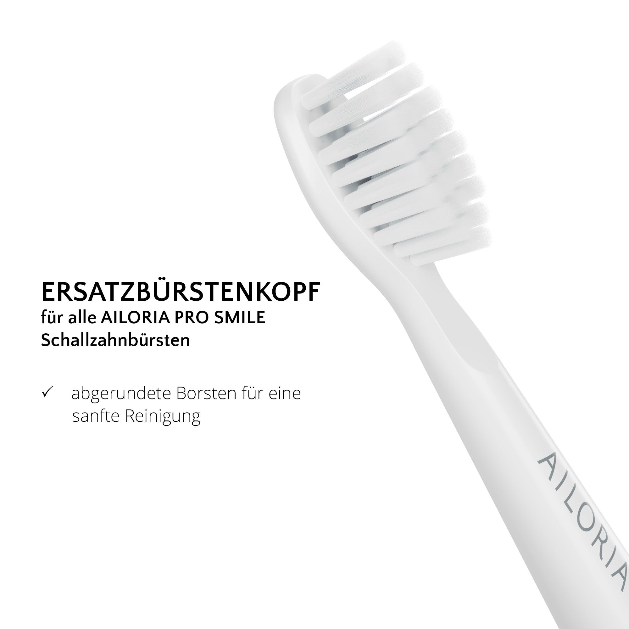 Primo piano di una testina bianca. Testo: Testina di ricambio per AILORIA PRO SMILE. Setole arrotondate.