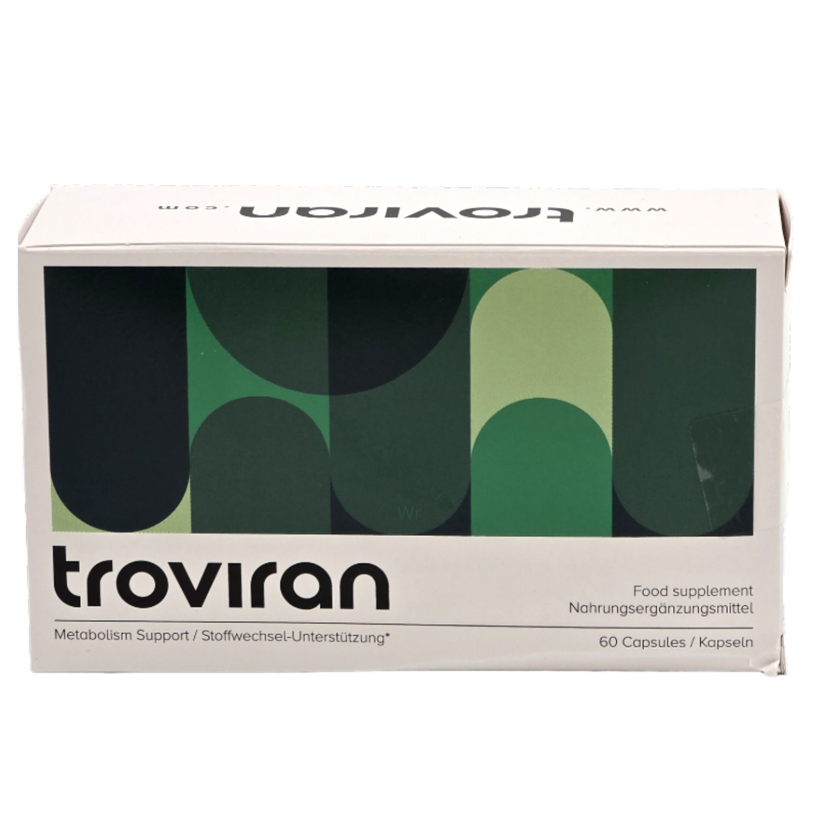 Confezione bianca con motivo verde e scritta "troviran". Contiene 60 capsule. Scritta: "Integratore alimentare".