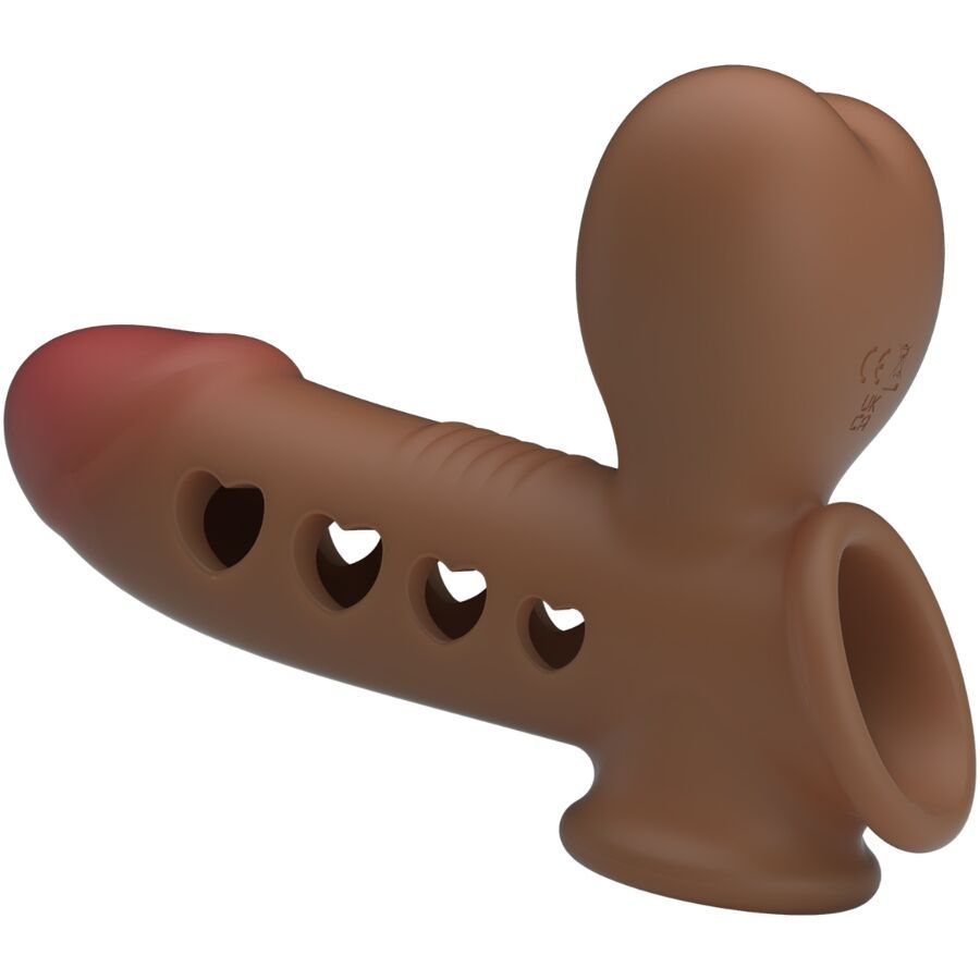Anello per pene marrone con intagli a forma di cuore e dettaglio a cuore. Marchio CE visibile.