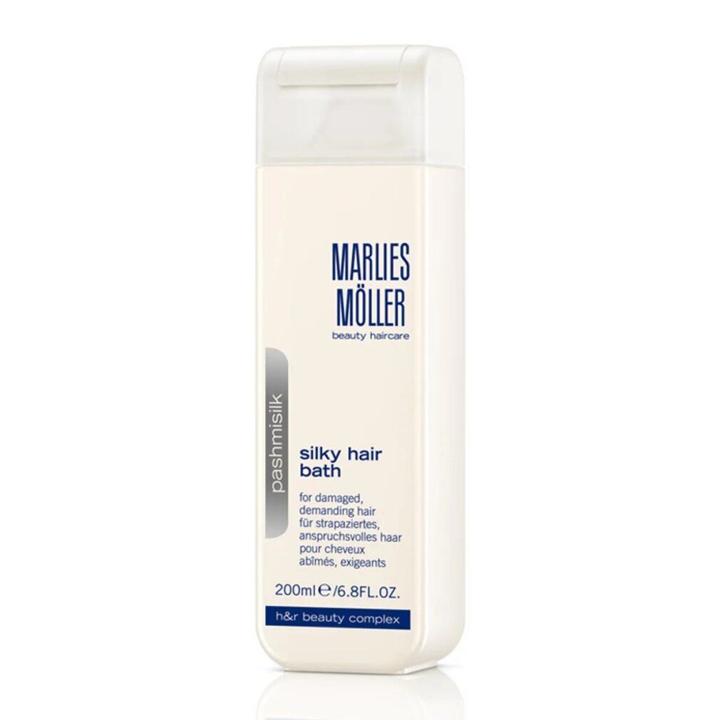 Flacone rettangolare bianco. Scritta: Marlies Möller, Pashmisilk Silky Hair Bath. 200ml/6.8FL.OZ. H&R beauty complex.