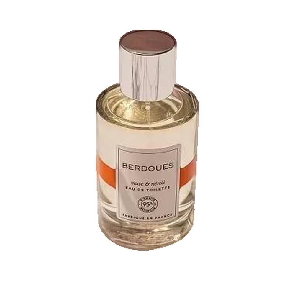Flacone di profumo con tappo argentato, etichetta bianca e fascia arancione. Scritta: BERDOUES, musc & néroli, Eau de Toilette.