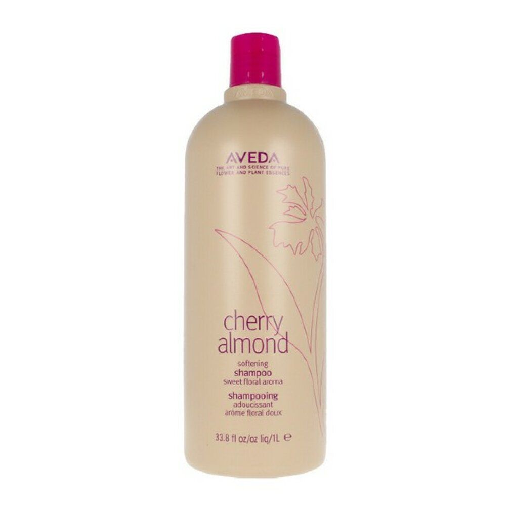 Grande flacone di shampoo beige con tappo rosa. Scritta: Cherry Almond, Aveda. 1L.