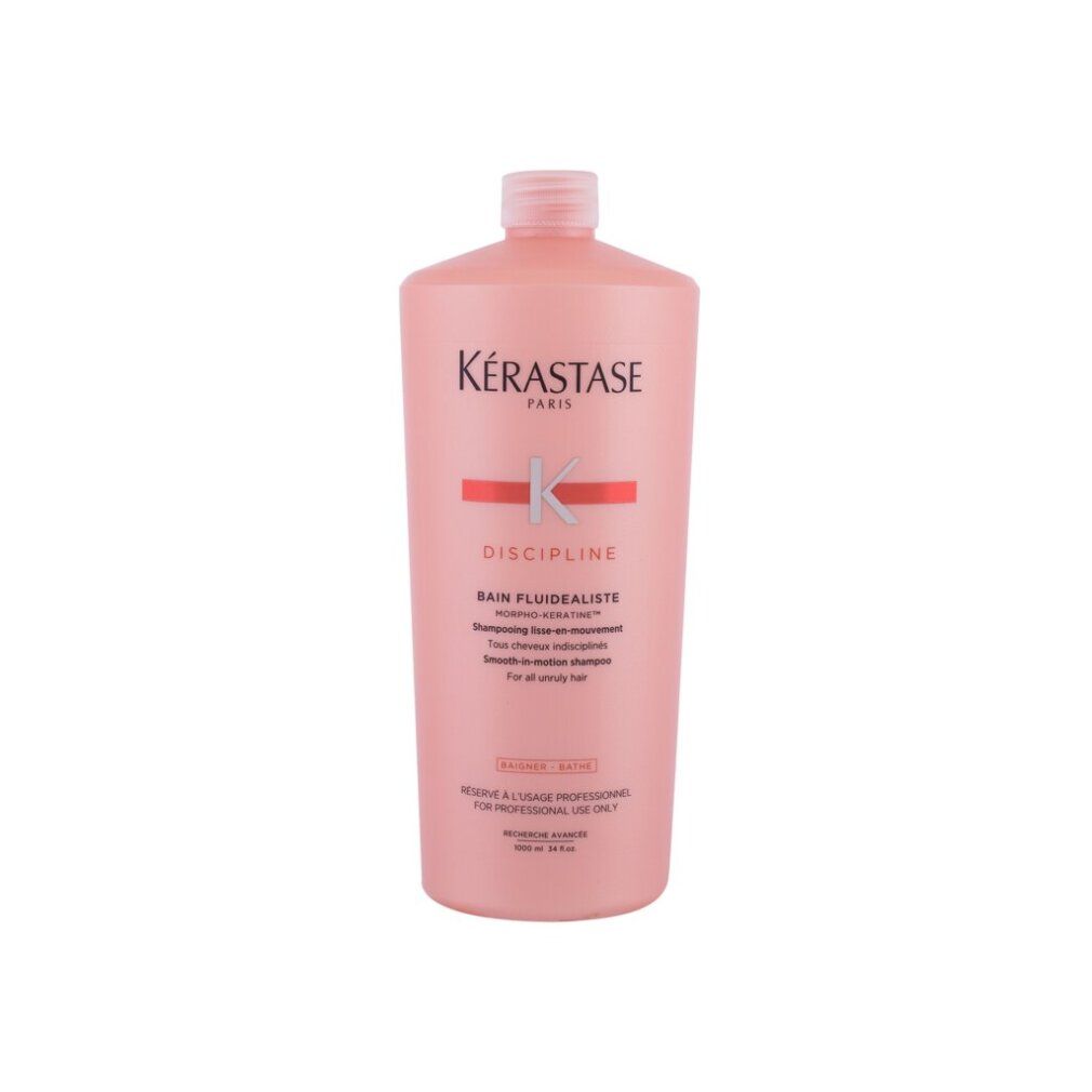 Flacone rosa di shampoo Kérastase Discipline Bain Fluidealiste. Scritta: Per tutti i tipi di capelli.