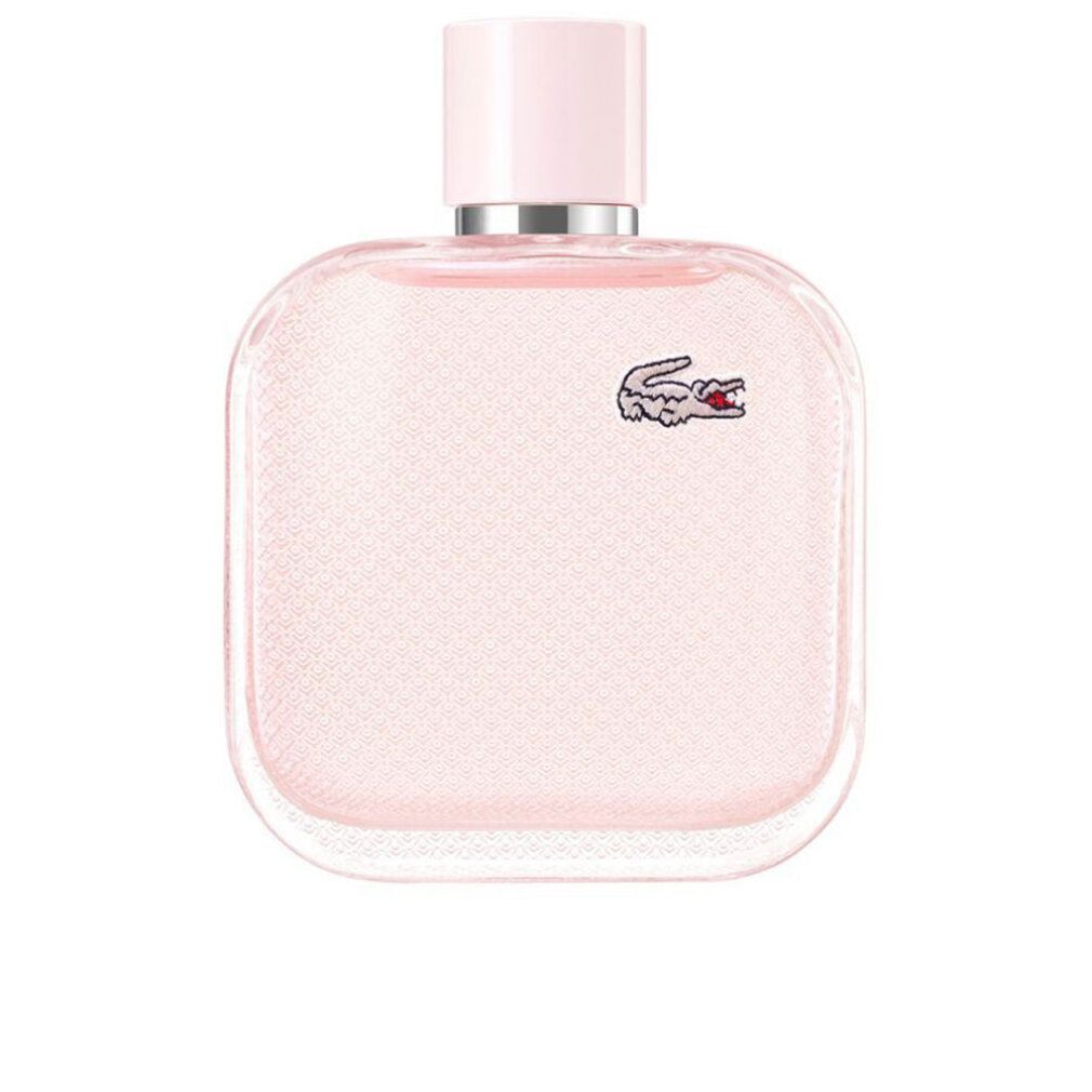 Flacone rosa con logo coccodrillo. Forma quadrata, tappo rosa.