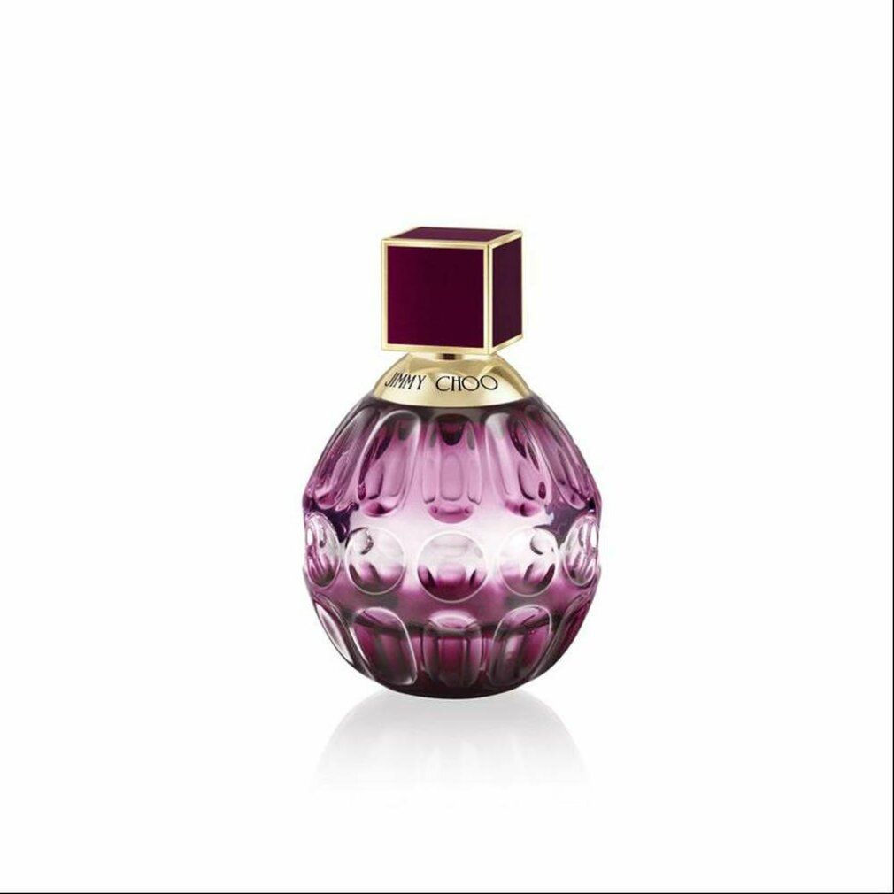 Flacone rotondo rosa di Eau de Parfum Jimmy Choo Fever. Tappo quadrato. Collo dorato.