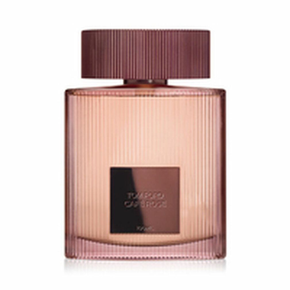 Flacone di profumo rettangolare con tappo marrone. Scritta sull'etichetta.