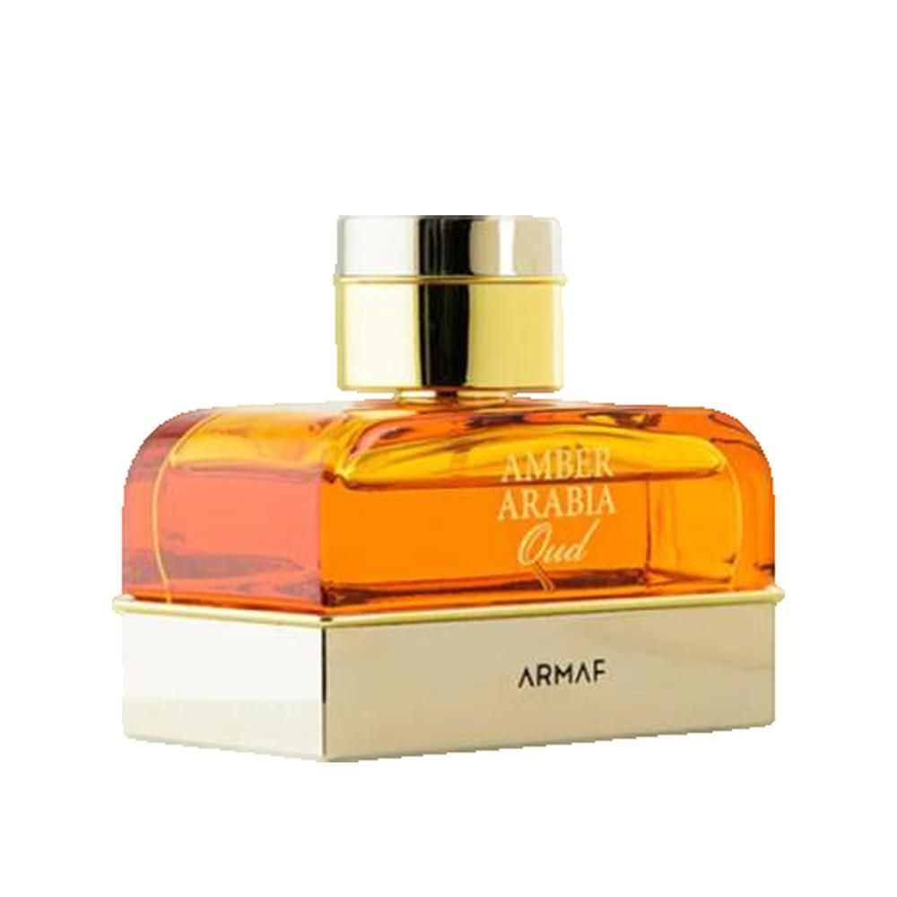 Flacone di profumo con tappo e base dorati. Scritta: Amber Arabia Oud, Armaf.