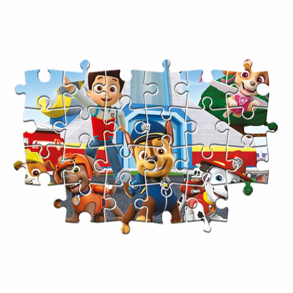 Puzzle Paw Patrol parzialmente assemblato. Personaggi: Ryder, Chase, Marshall, Skye, Rubble. Sfondo: edificio.