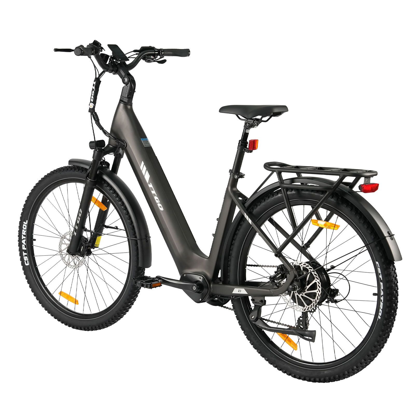 E-bike grigio scuro con parafanghi, portapacchi e freni a disco idraulici. Il logo TTGO è visibile.