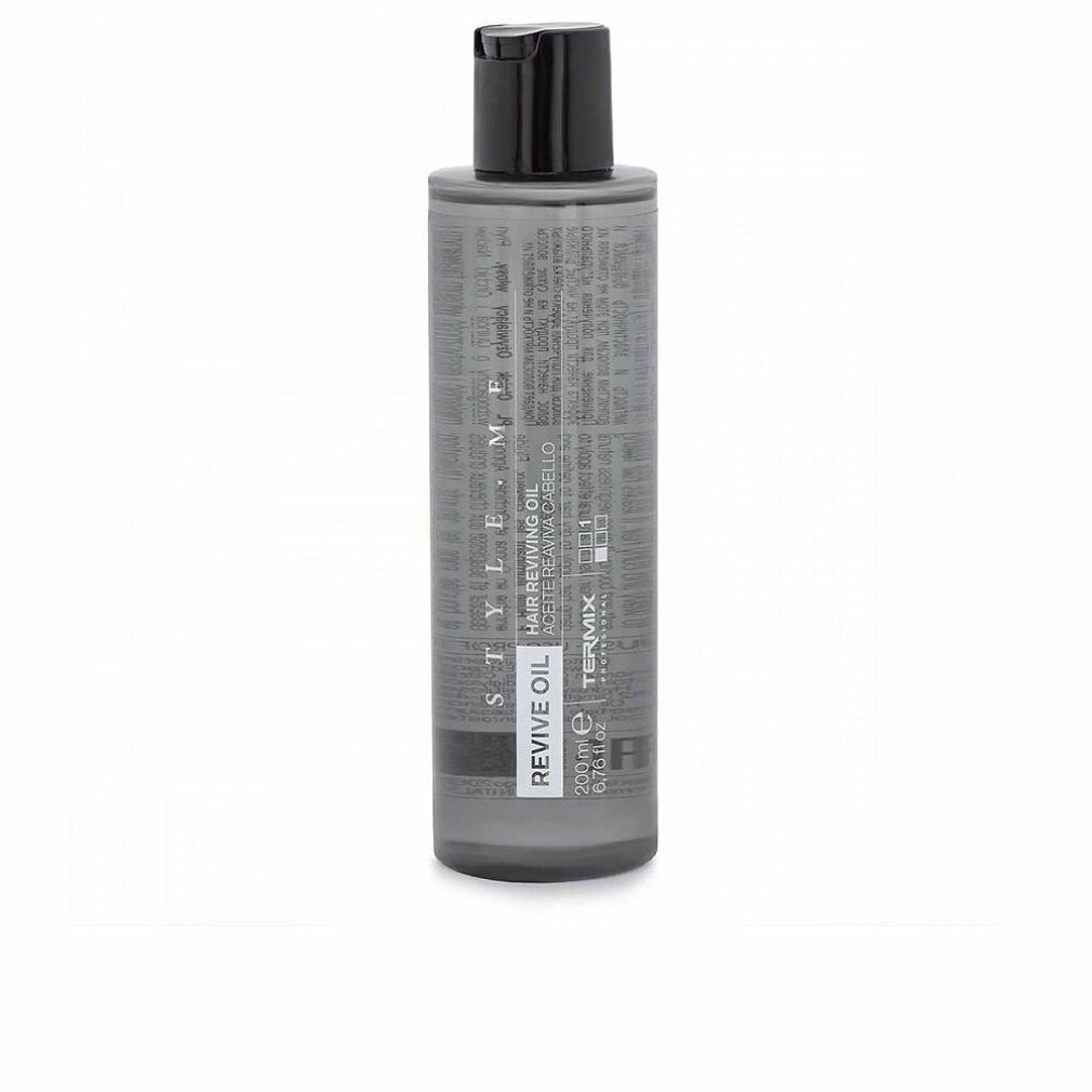 Flacone cilindrico con tappo nero. Scritte: REVIVE OIL, STYLE.ME, TERMIX. Liquido grigio visibile.