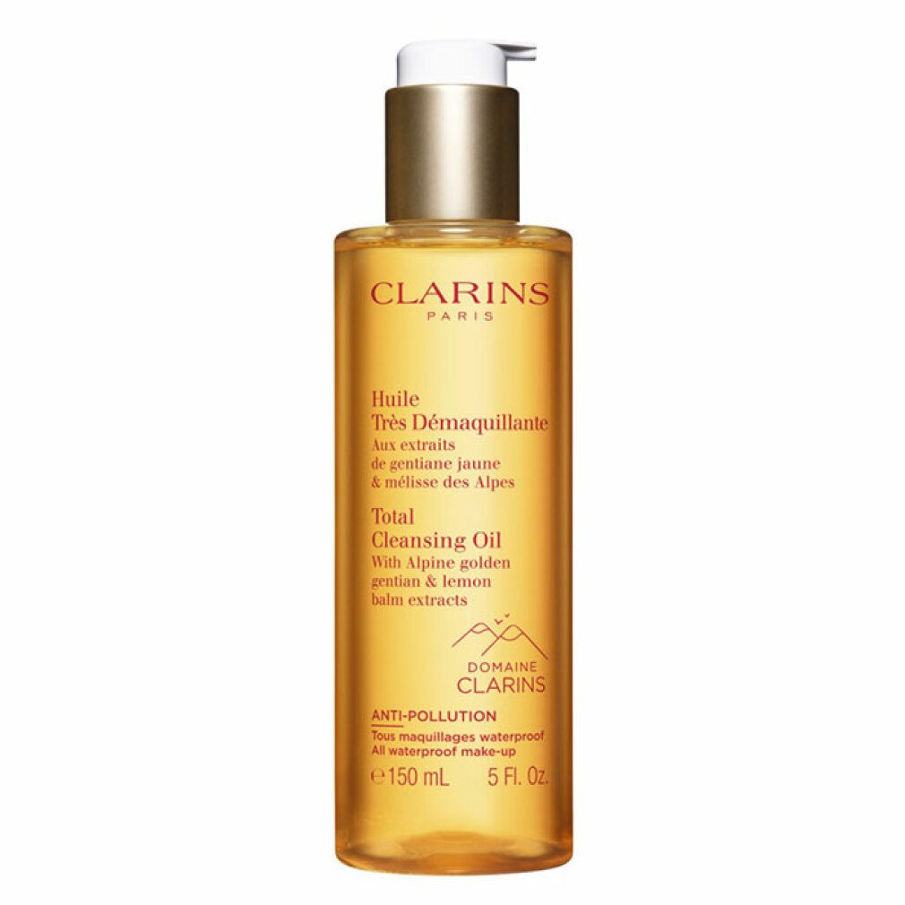 Flacone trasparente con liquido dorato e dosatore. Scritte: Clarins Total Cleansing Oil, 150 ml.