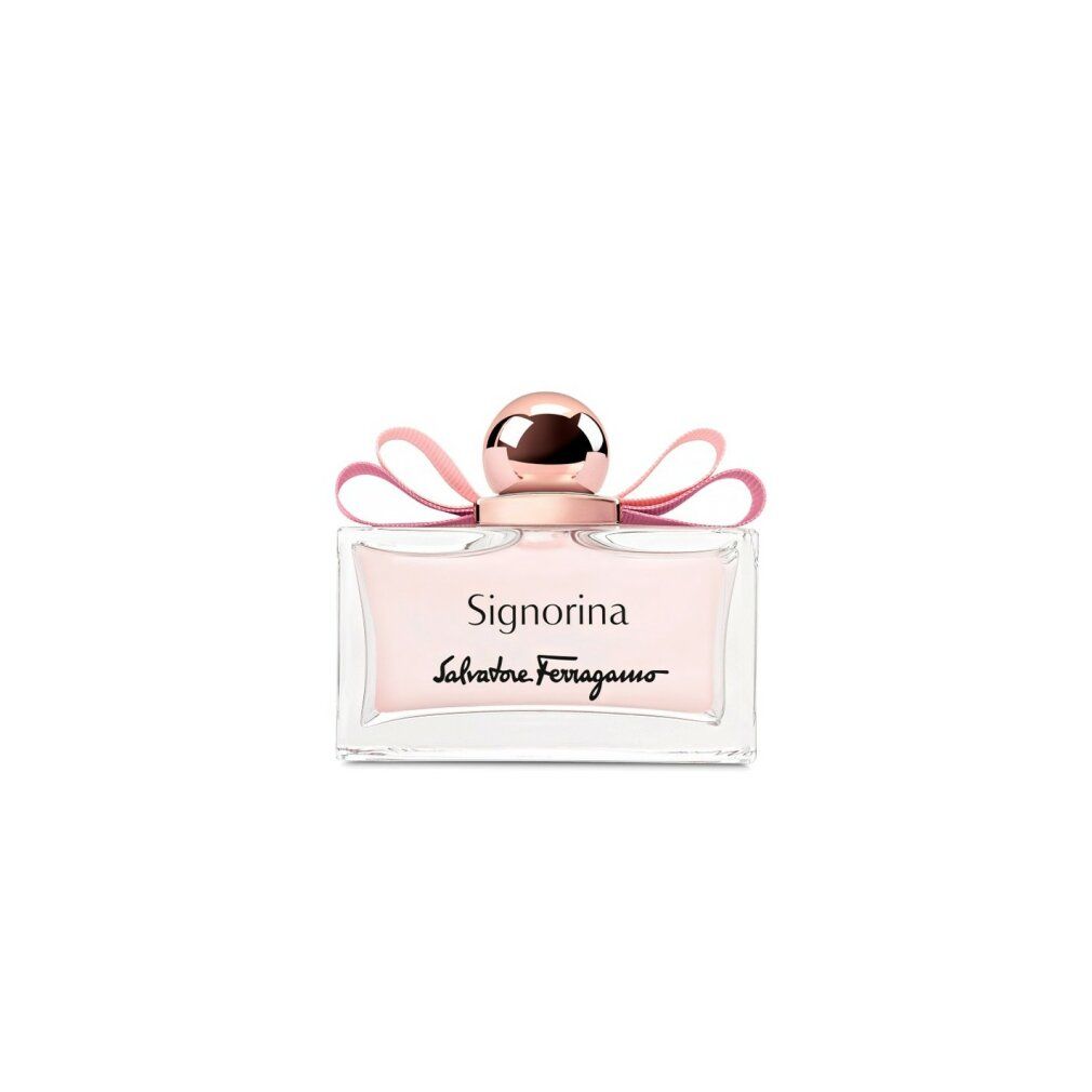 Flacone di profumo con liquido rosa, tappo dorato e fiocco rosa. Scritta Signorina e Salvatore Ferragamo.