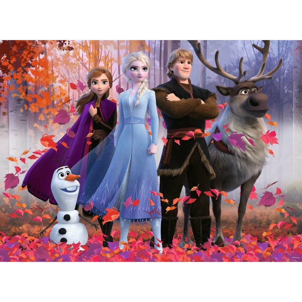 Puzzle Frozen 2 completato. Raffigurati Elsa, Anna, Kristoff, Olaf e Sven in una foresta. Pezzi del puzzle visibili.