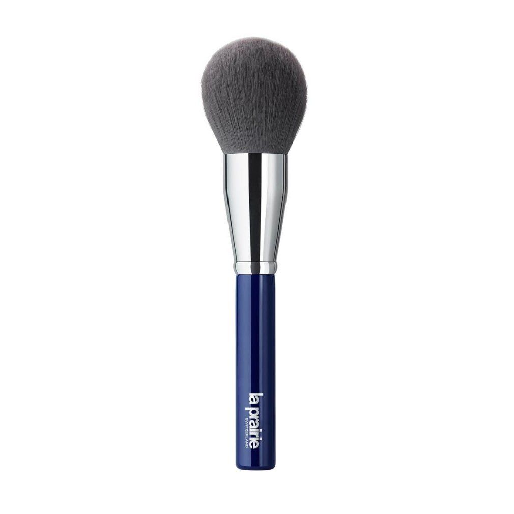 Pennello rotondo con manico blu scuro e ghiera argentata. Setole nere e rotonde. Sul manico è scritto "la prairie Switzerland".
