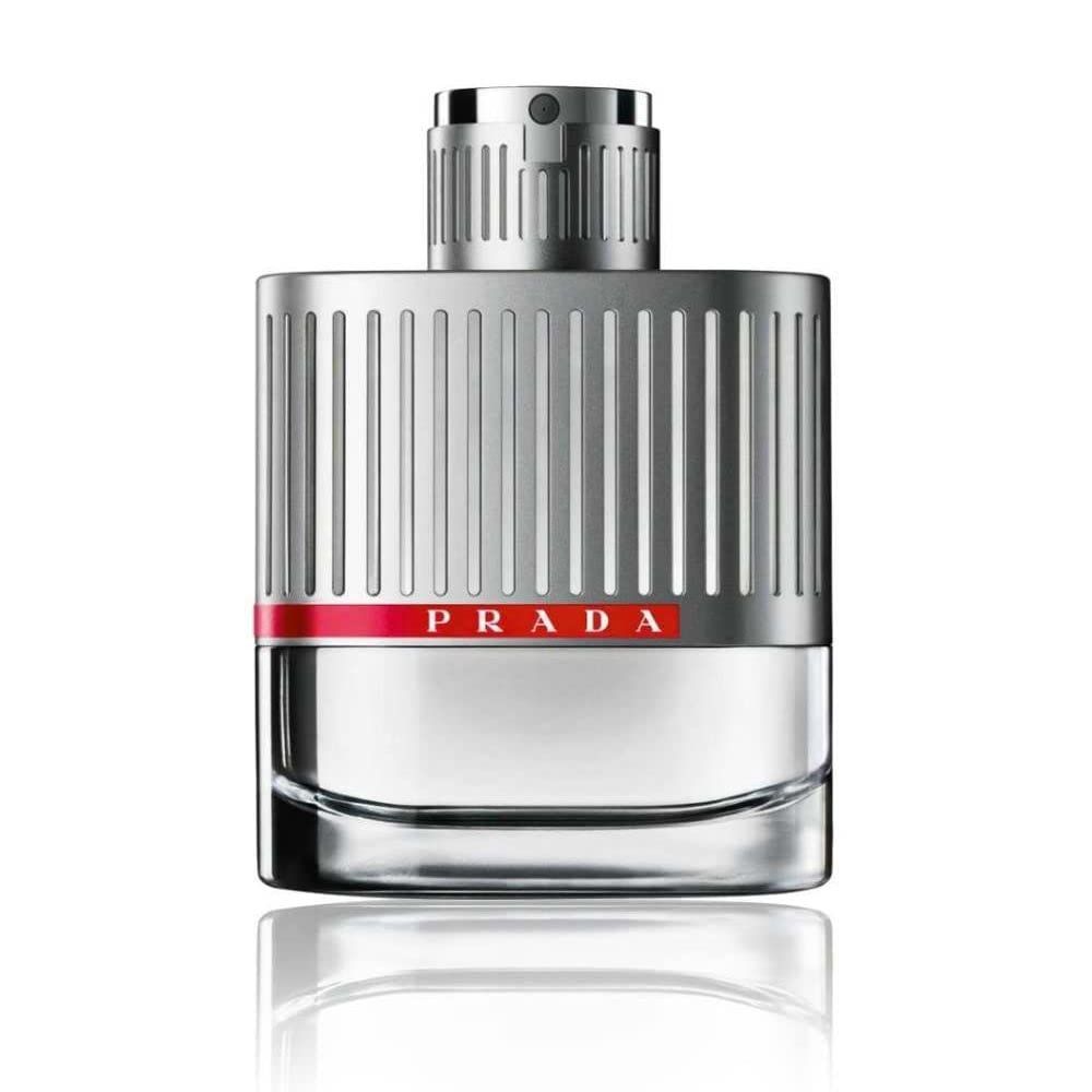 Flacone Prada Luna Rossa Eau de Toilette. Design argentato con striscia rossa e logo Prada. Contenitore trasparente.